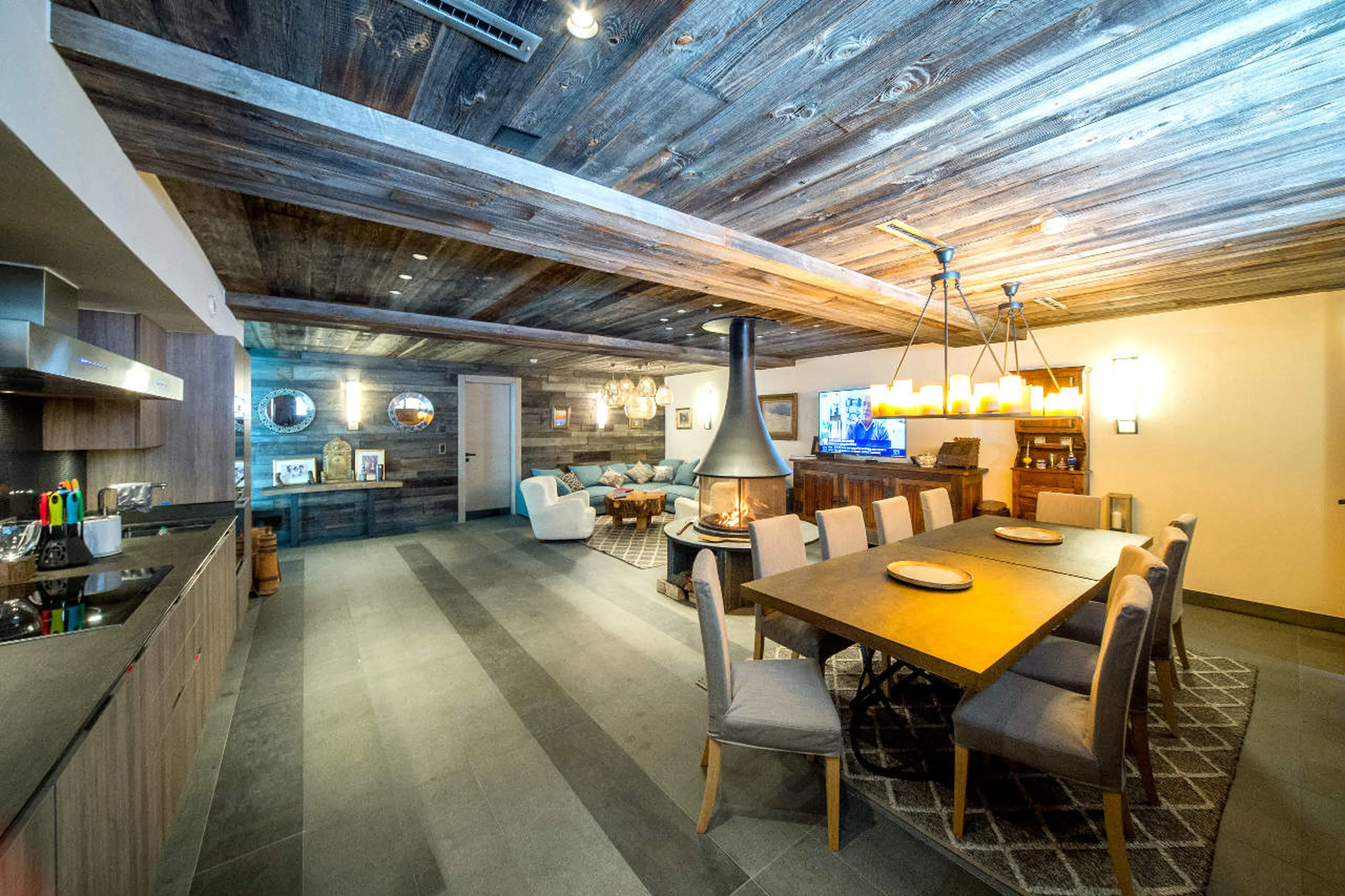Single-wall kitchen of entertainment area in Chalet Migui in Crans-Montana