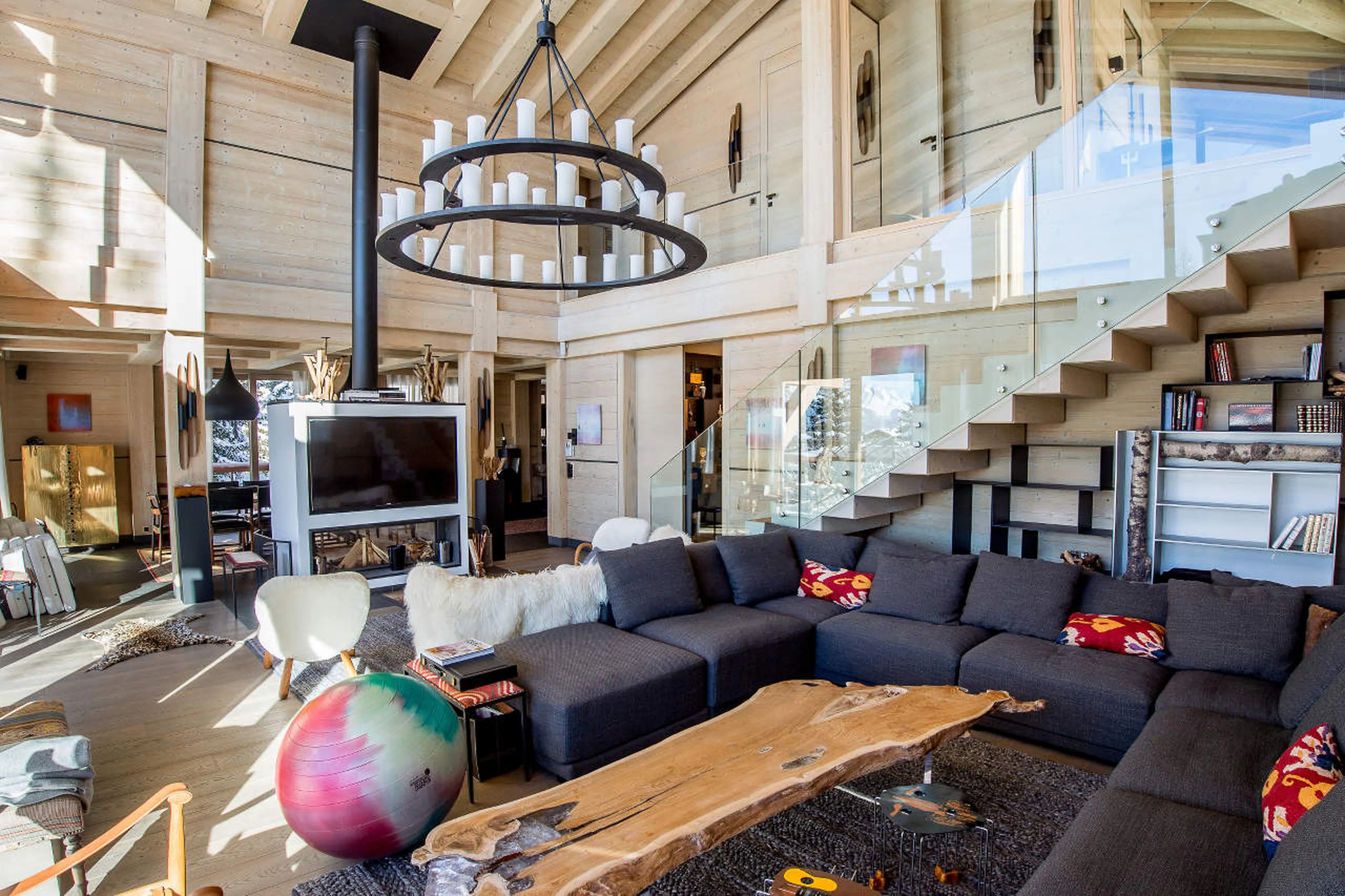 Living room with fireplace, Chalet Migui in Crans-Montana
