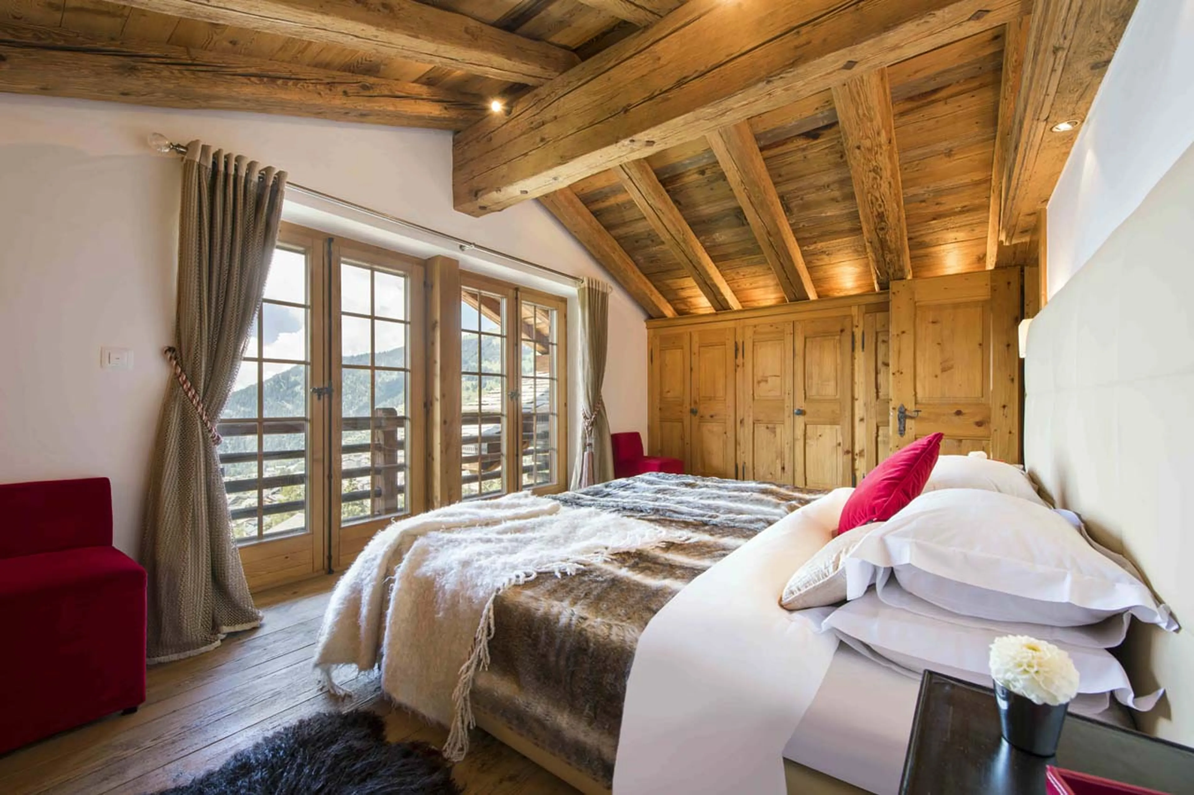 Access to private balcony from master bedroom at Chalet Milou in Verbier