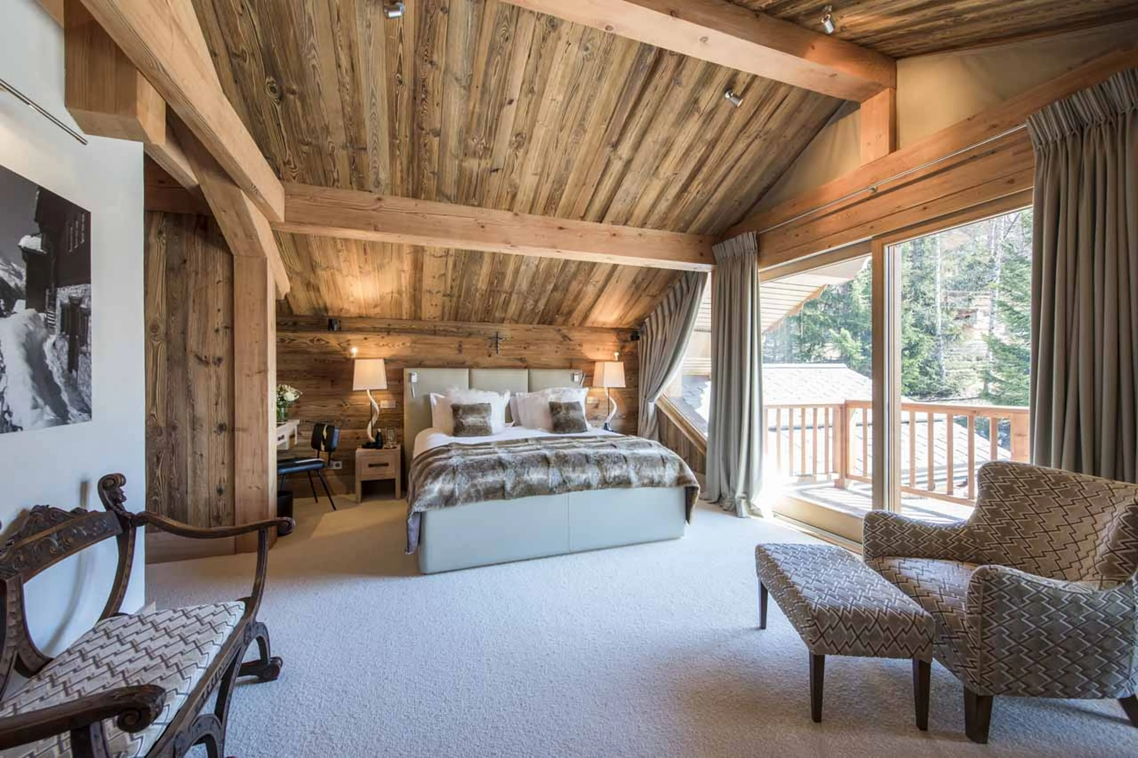 Seating area in bedroom one at Chalet Mont Tremblant in Meribel