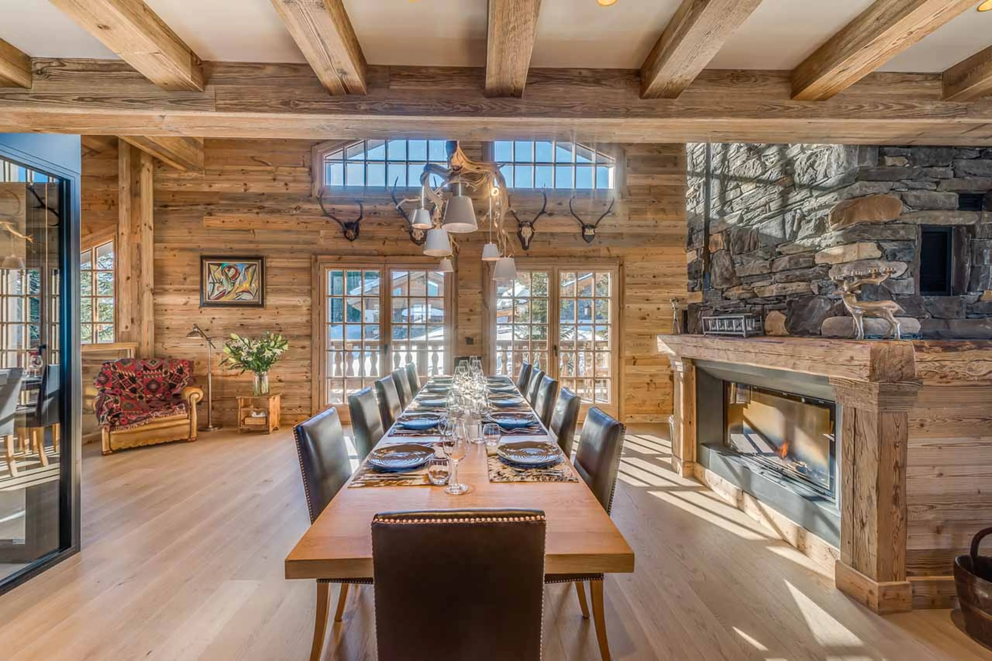 Dining area opening onto terrace at Chalet Le Namaste in Courchevel 1850