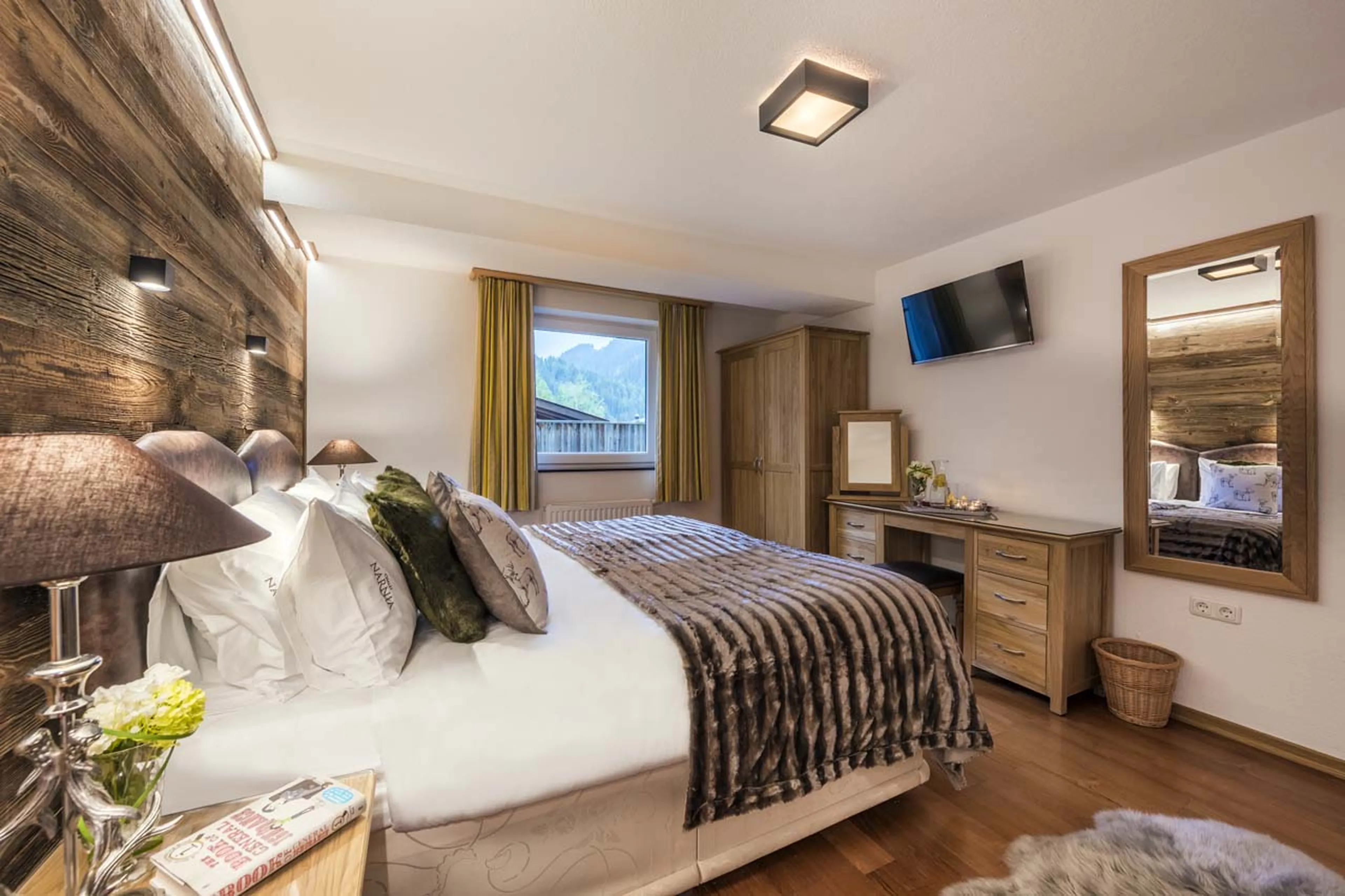 TV in bedroom 2 at Chalet Narnia in St Anton