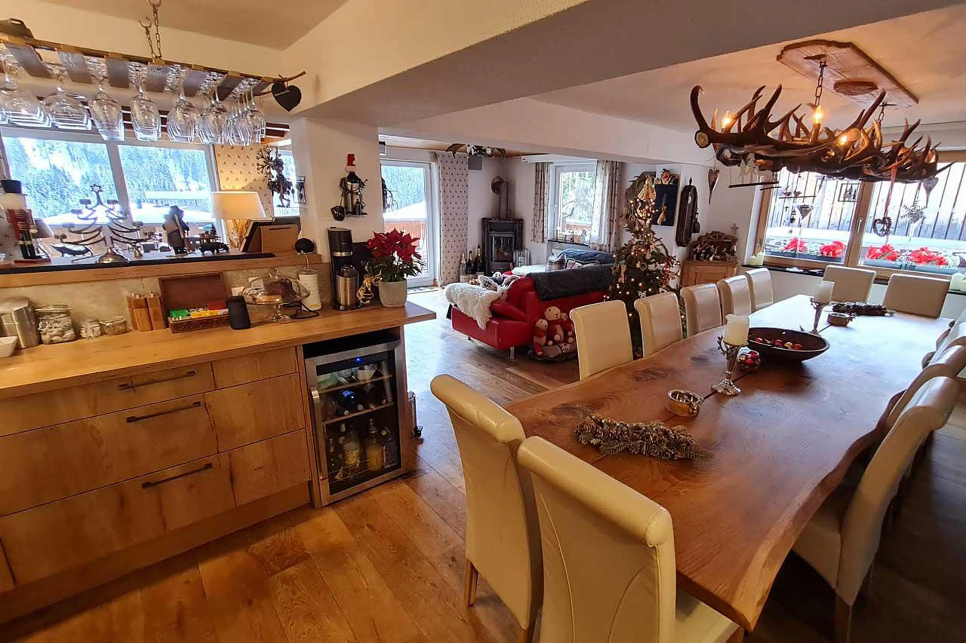 Dining table with overhead Antler lighting at Chalet Narnia in St Anton