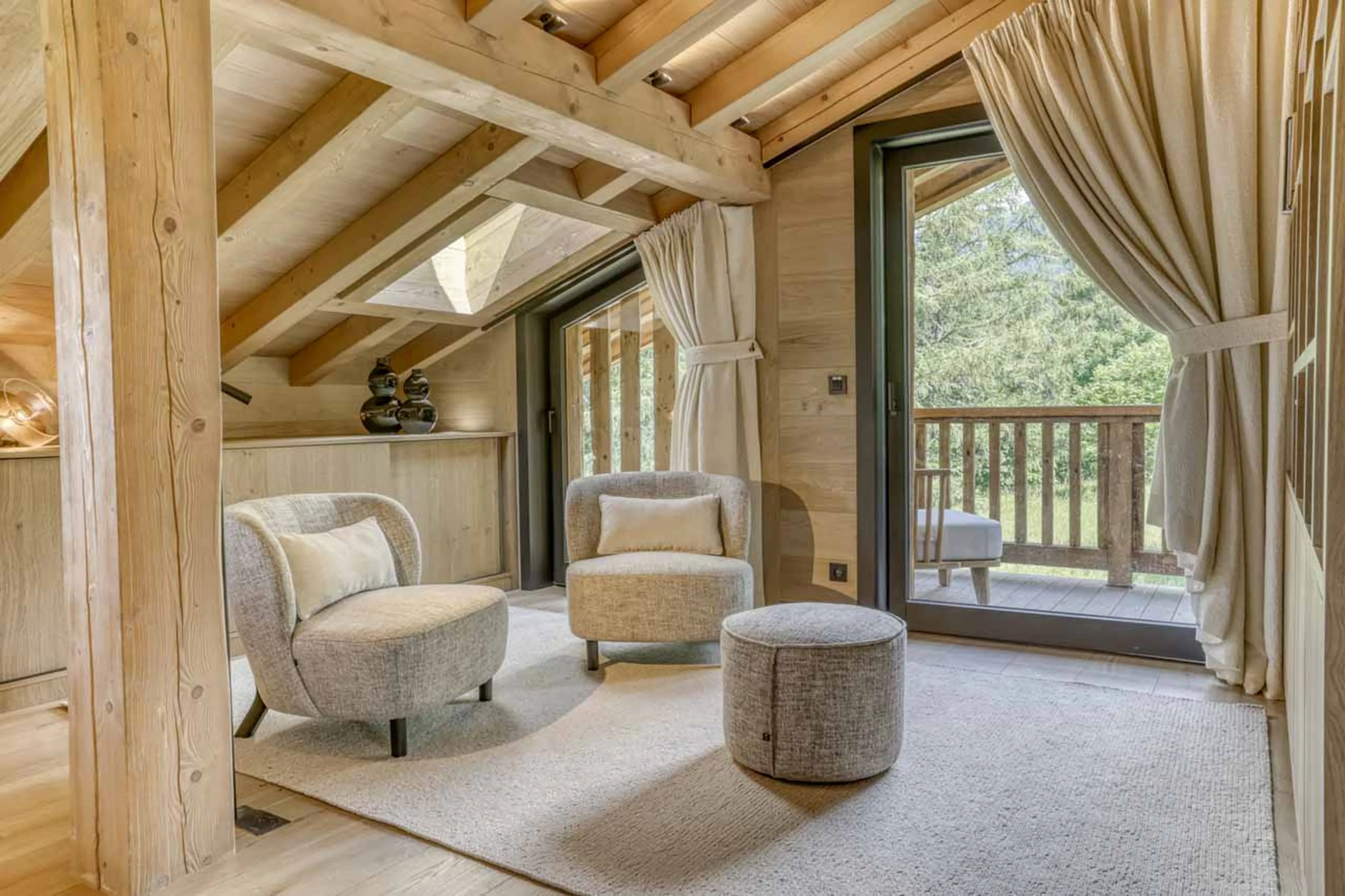 Master suite with balcony access at Chalet Olivier in Megeve