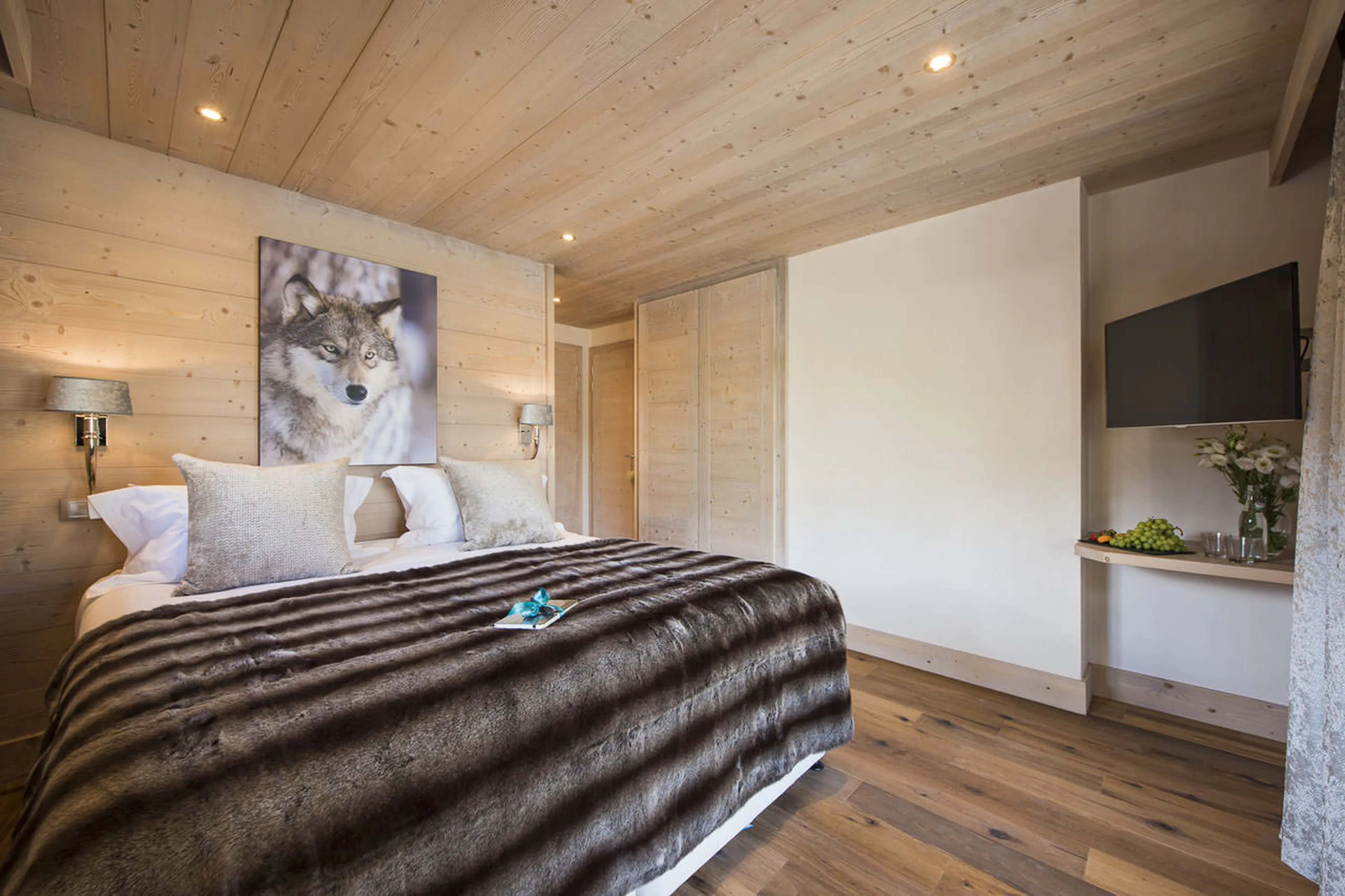 TV in bedroom three at Chalet Opale in Tignes