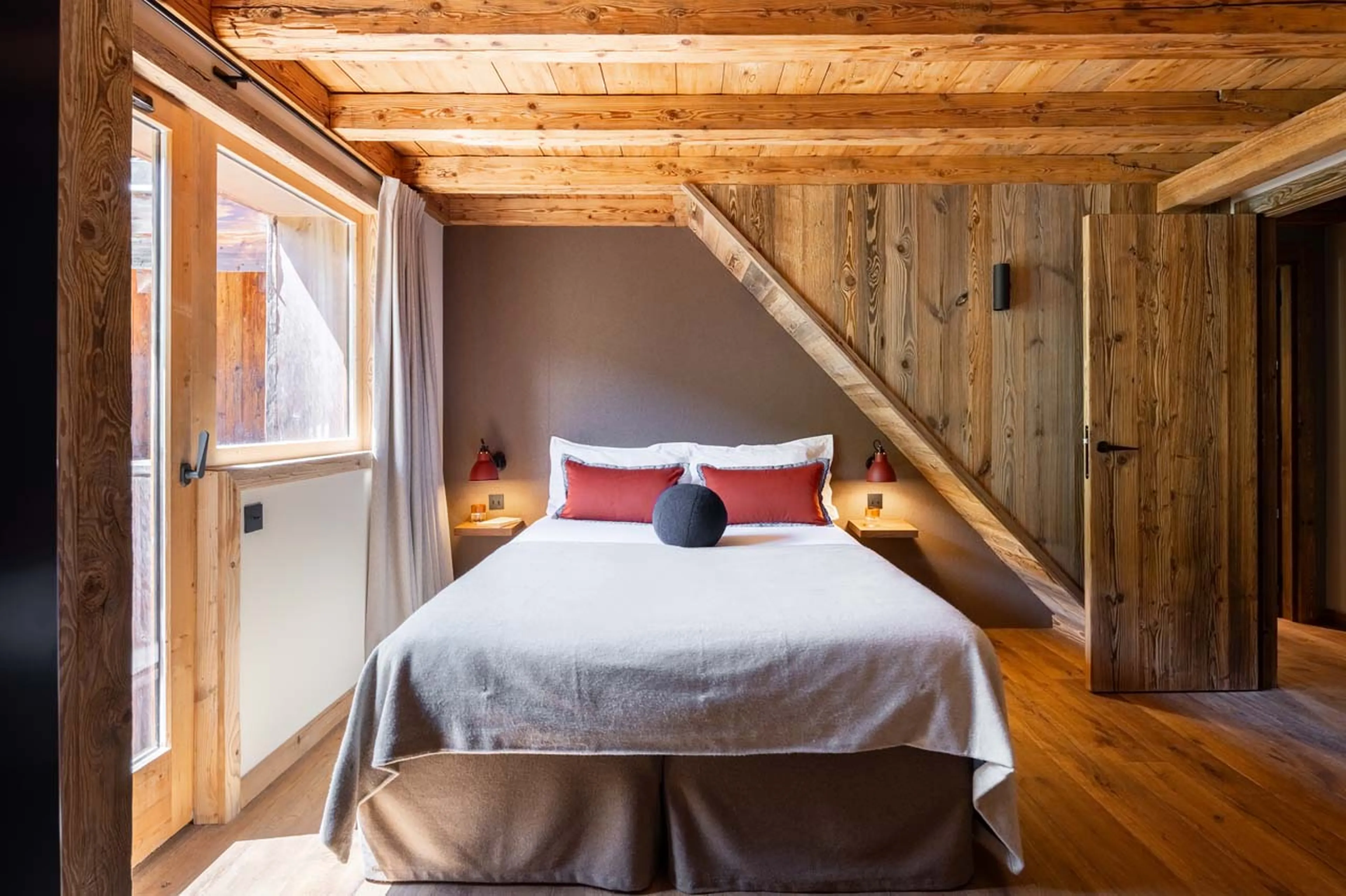 Balcony access from bedroom 2 at Chalet L'Orchidée in Meribel