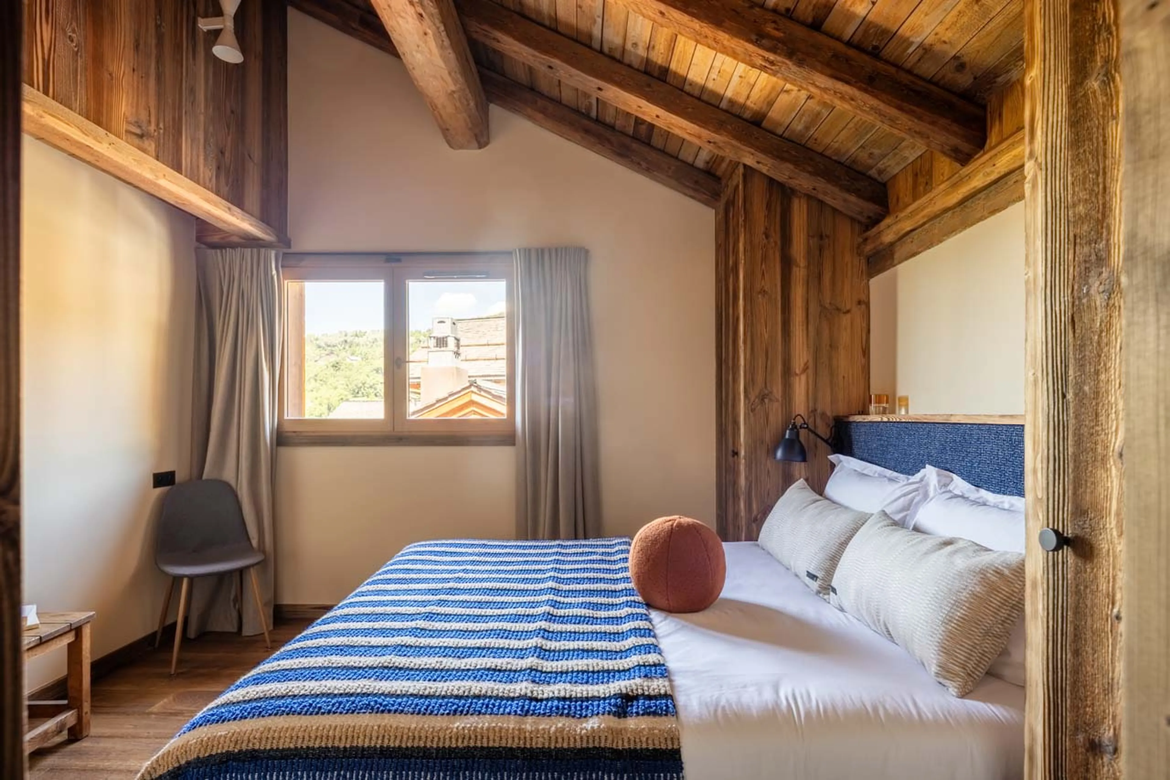 Comfortable bedroom three at Chalet L'Orchidée in Meribel