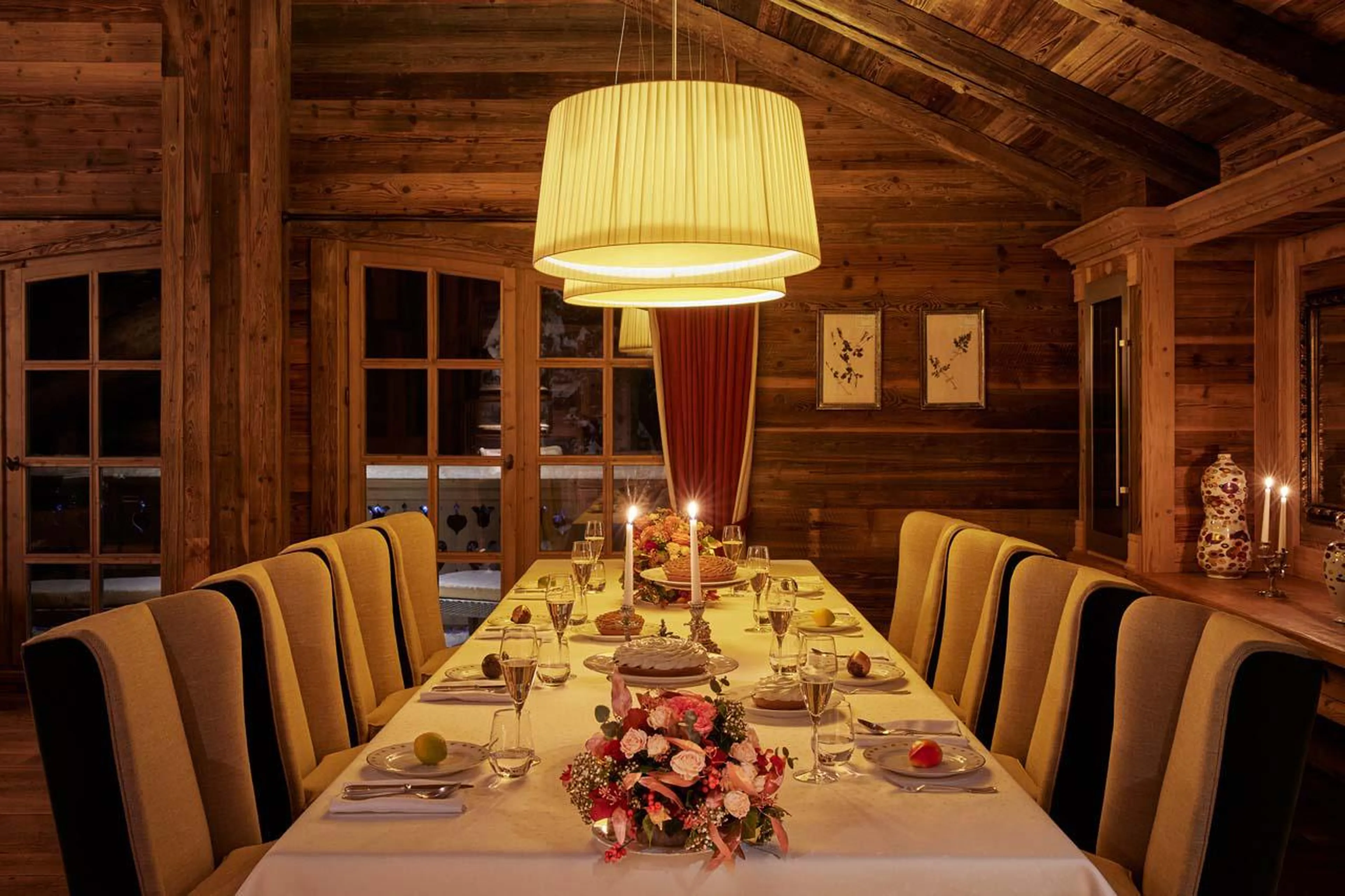 Elegant dining space in open plan living area of Chalet Ormello in Courchevel 1850