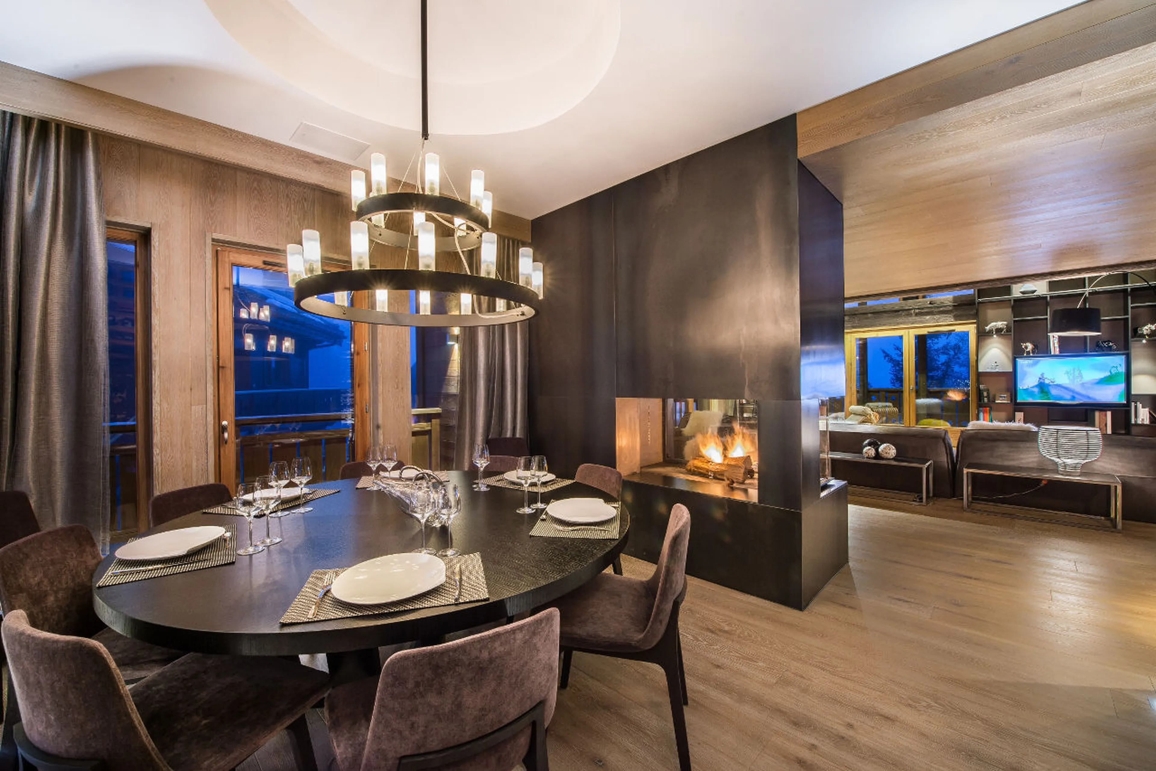 Dining room adjacent to kitchen in Chalet Overview in Courchevel 1650