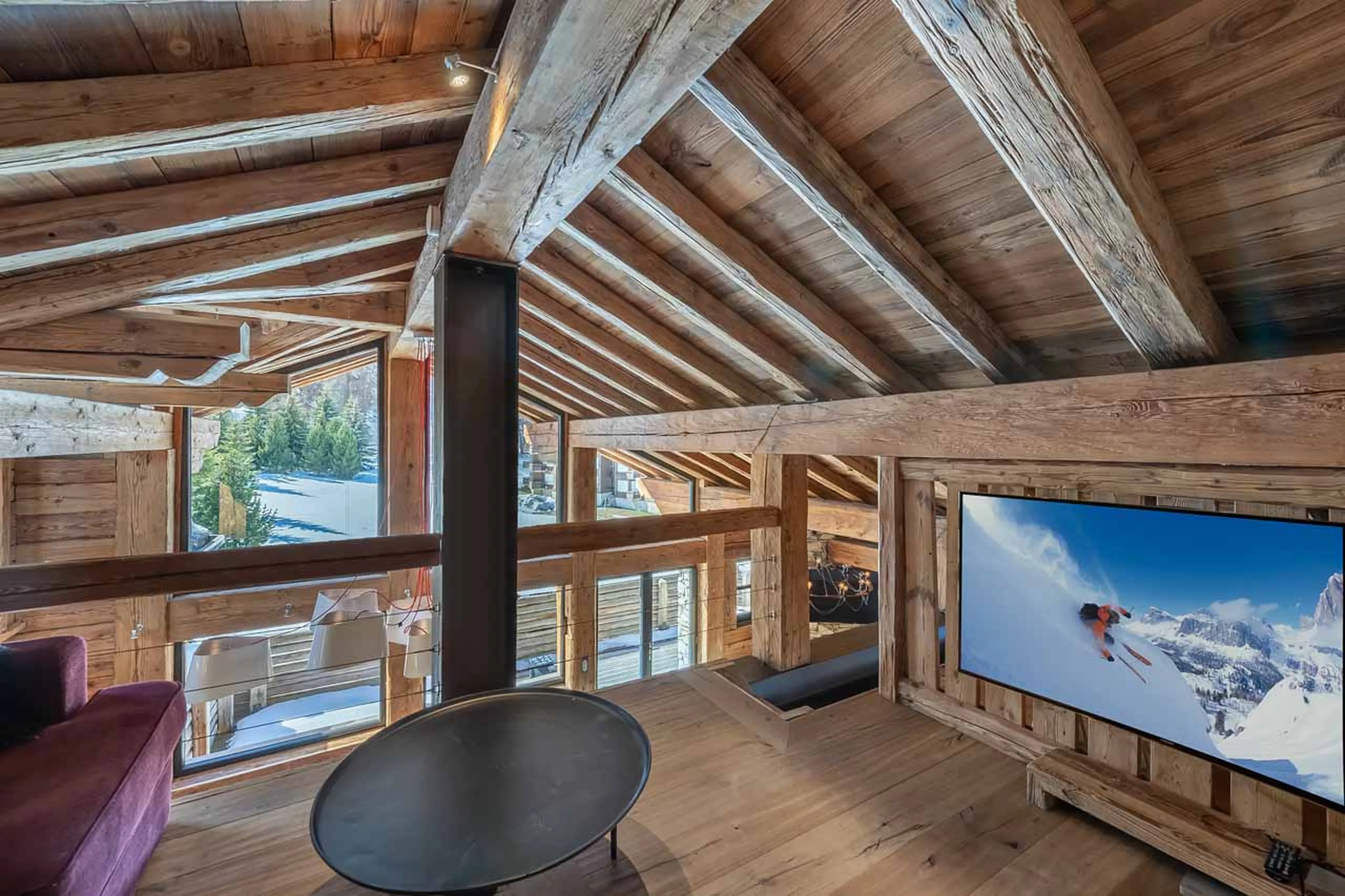 Mezzanine TV area at Chalet Le Papillon in Val d'Isere