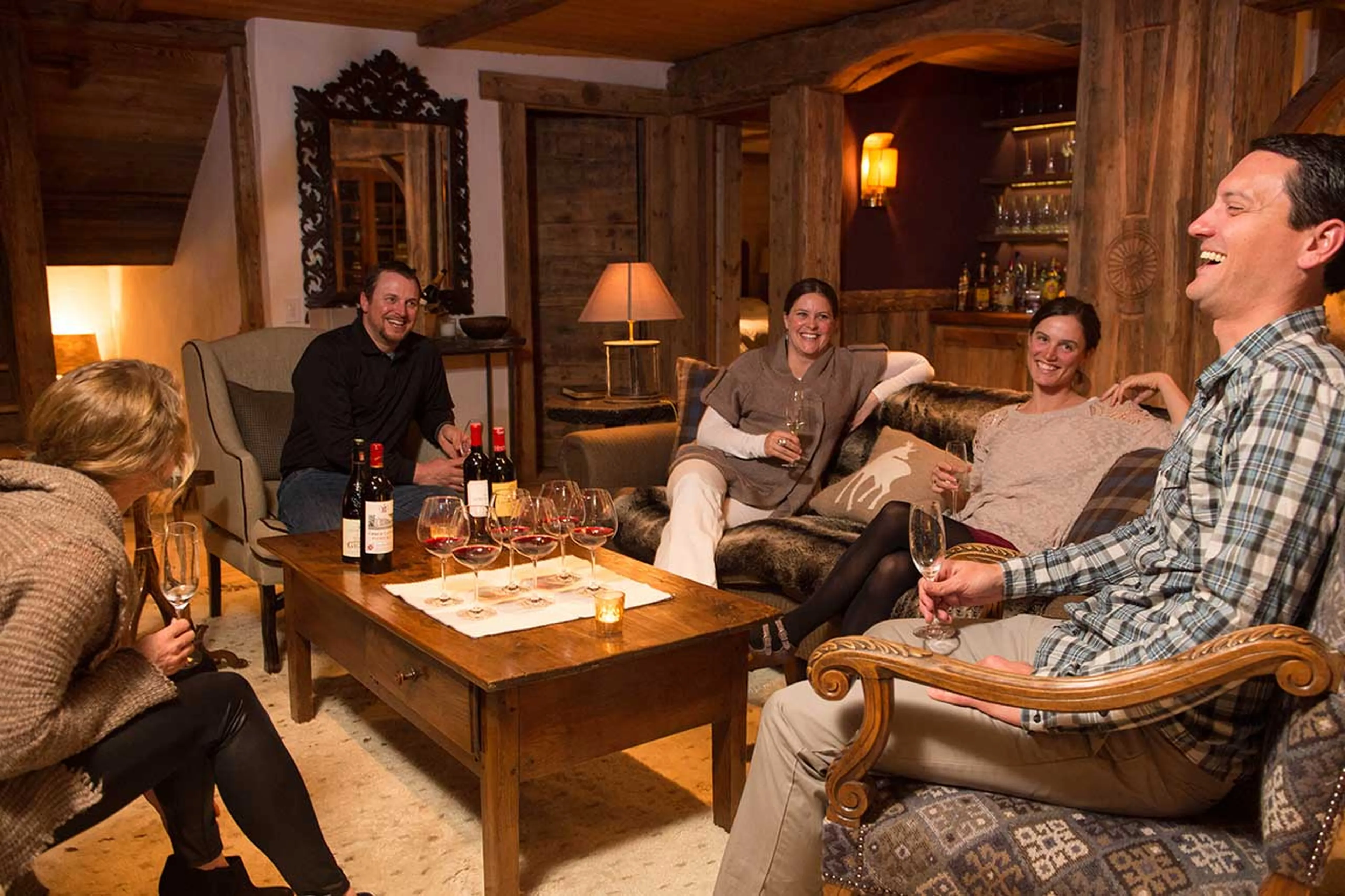 Socialising in living room at Chalet Pelerin in Le Miroir