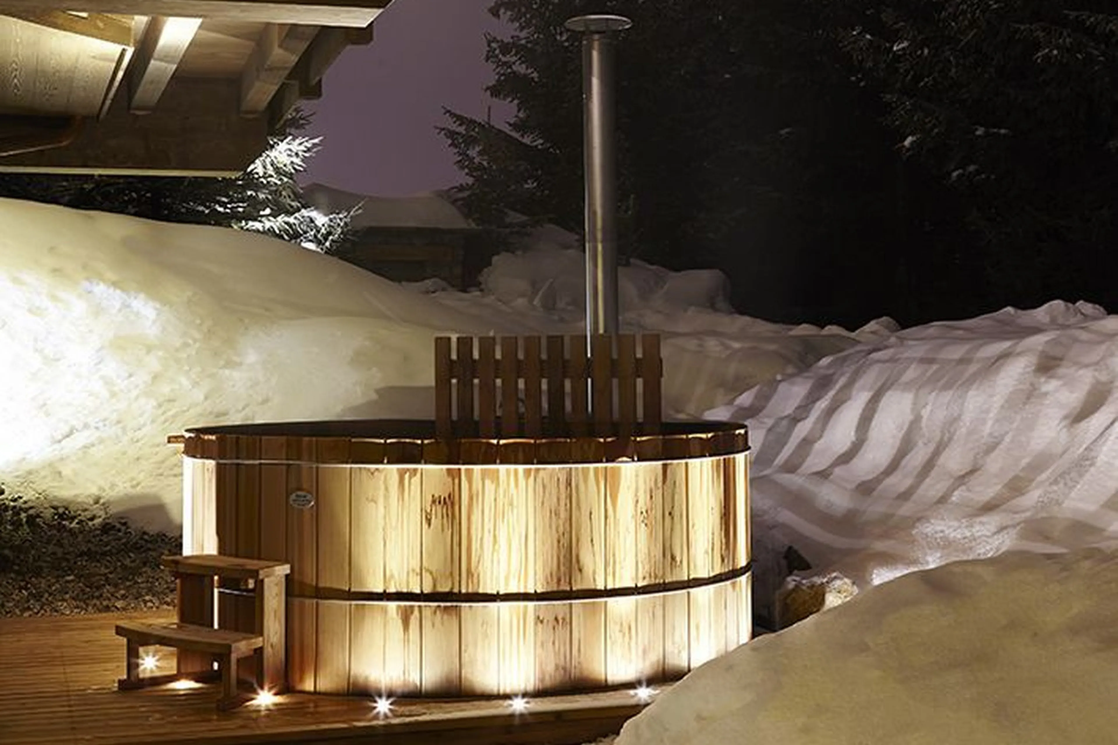Terrace with lovely outdoor hot tub in Chalet Perce Neige, Courchevel 1850