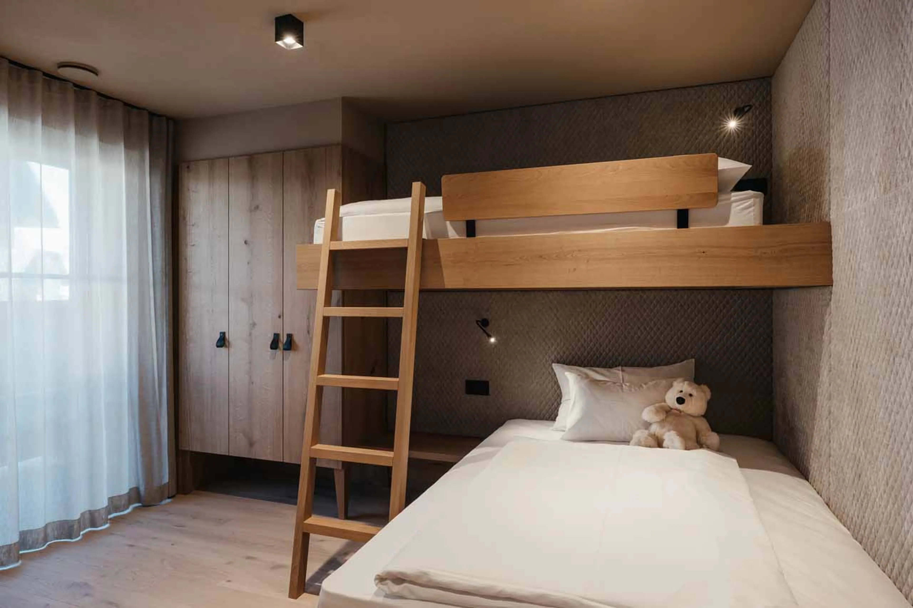 Bedroom four at Chalet Pescosta in Kronplatz