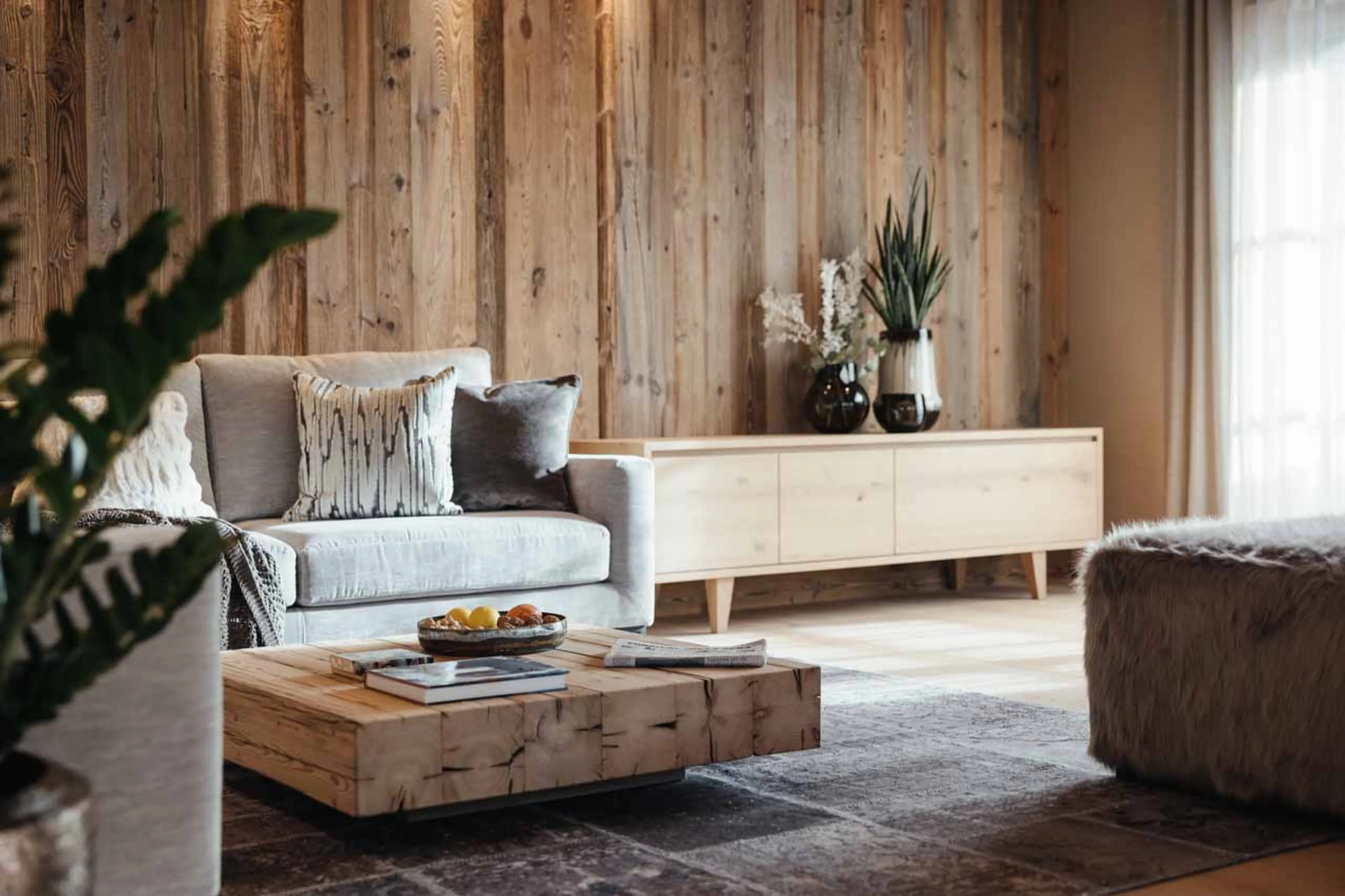 Sofas in living area at Chalet Pescosta in Kronplatz