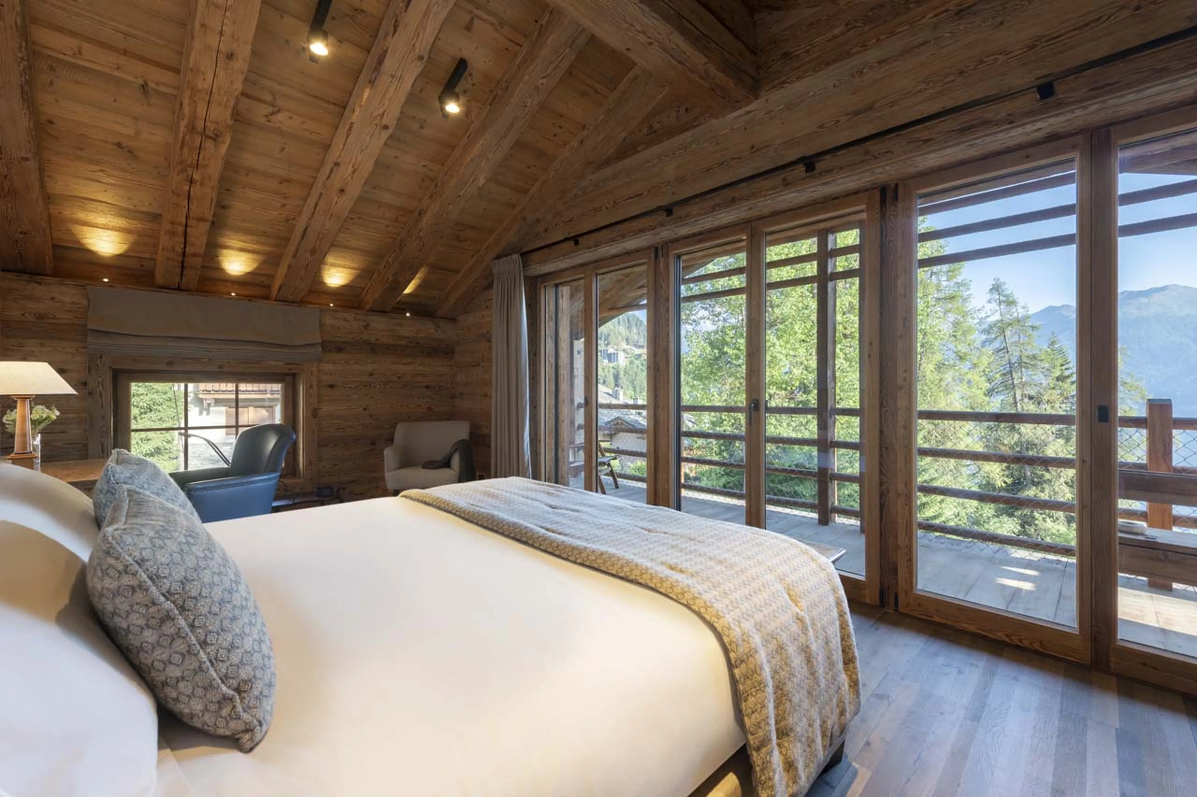 Master suite leading to terrace at Chalet Peter Pan in Verbier