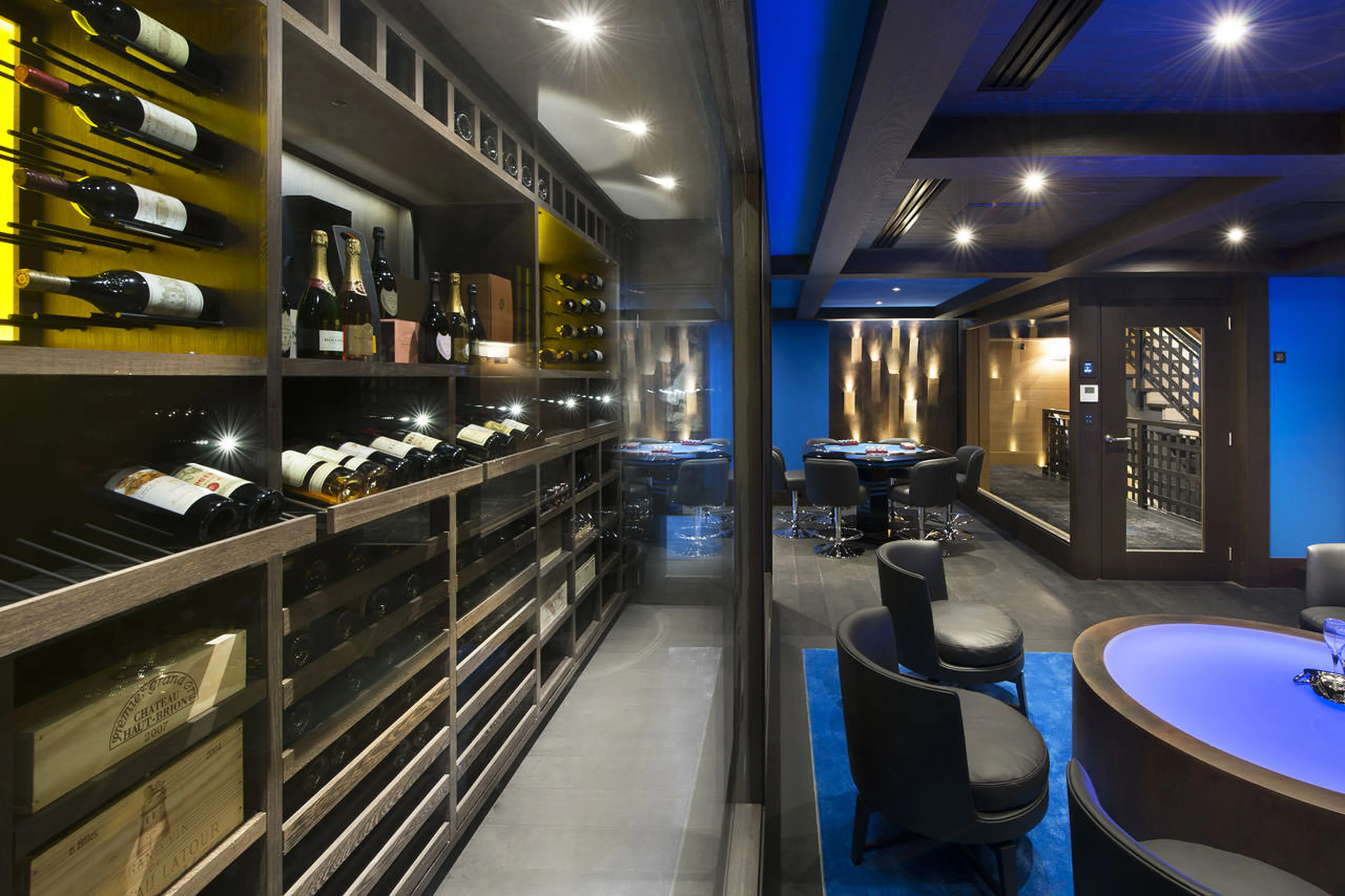 Bar lounge with a selection of wines in chalet Le Petit Palais in Courchevel 1850