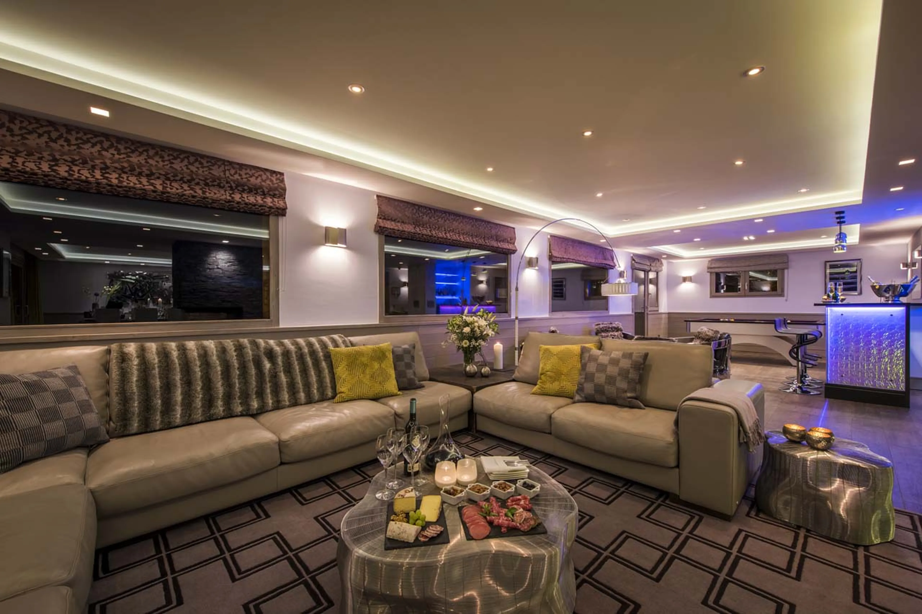 Lounge area at night at Chalet Pont du Cam in Meribel