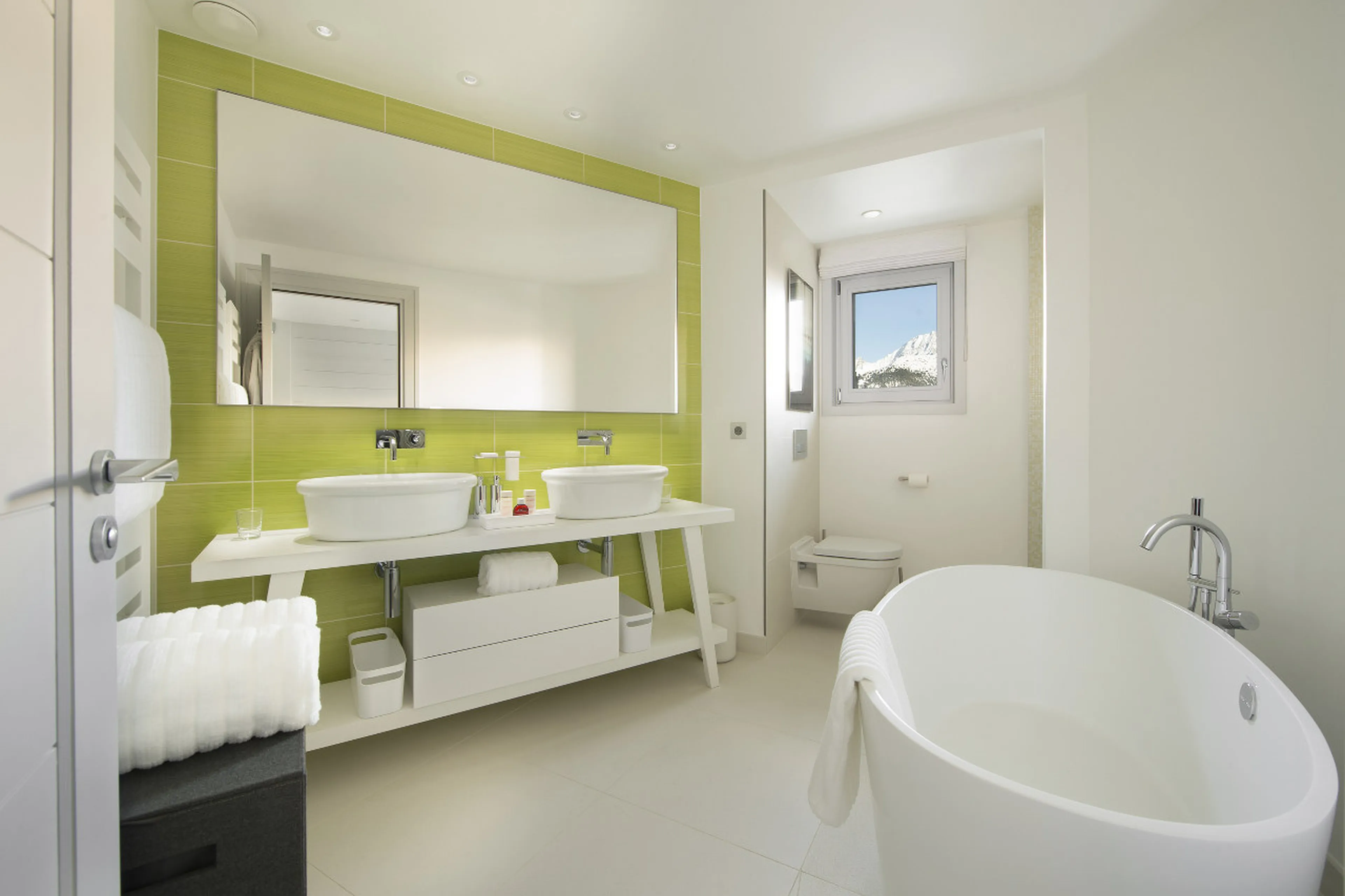 En-suite bathroom with double basin in Chalet Pow Pow, Courchevel 1850