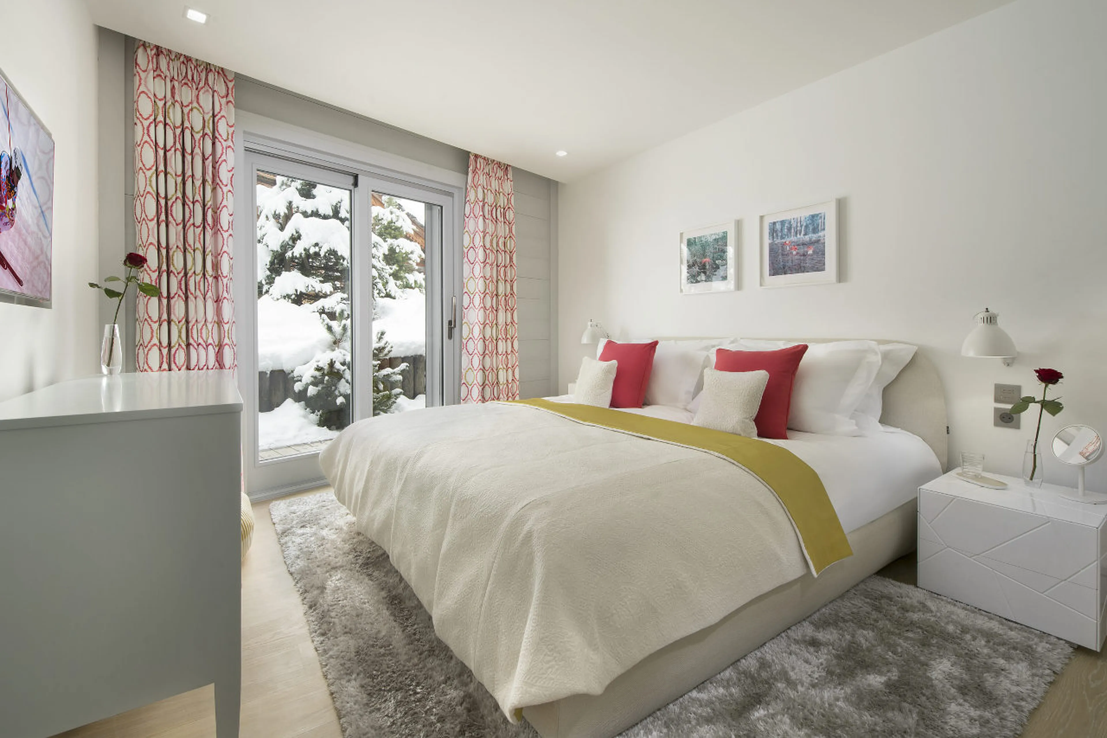 Double bedroom with en-suite bathroom and garden access in Chalet Pow Pow, Courchevel 1850