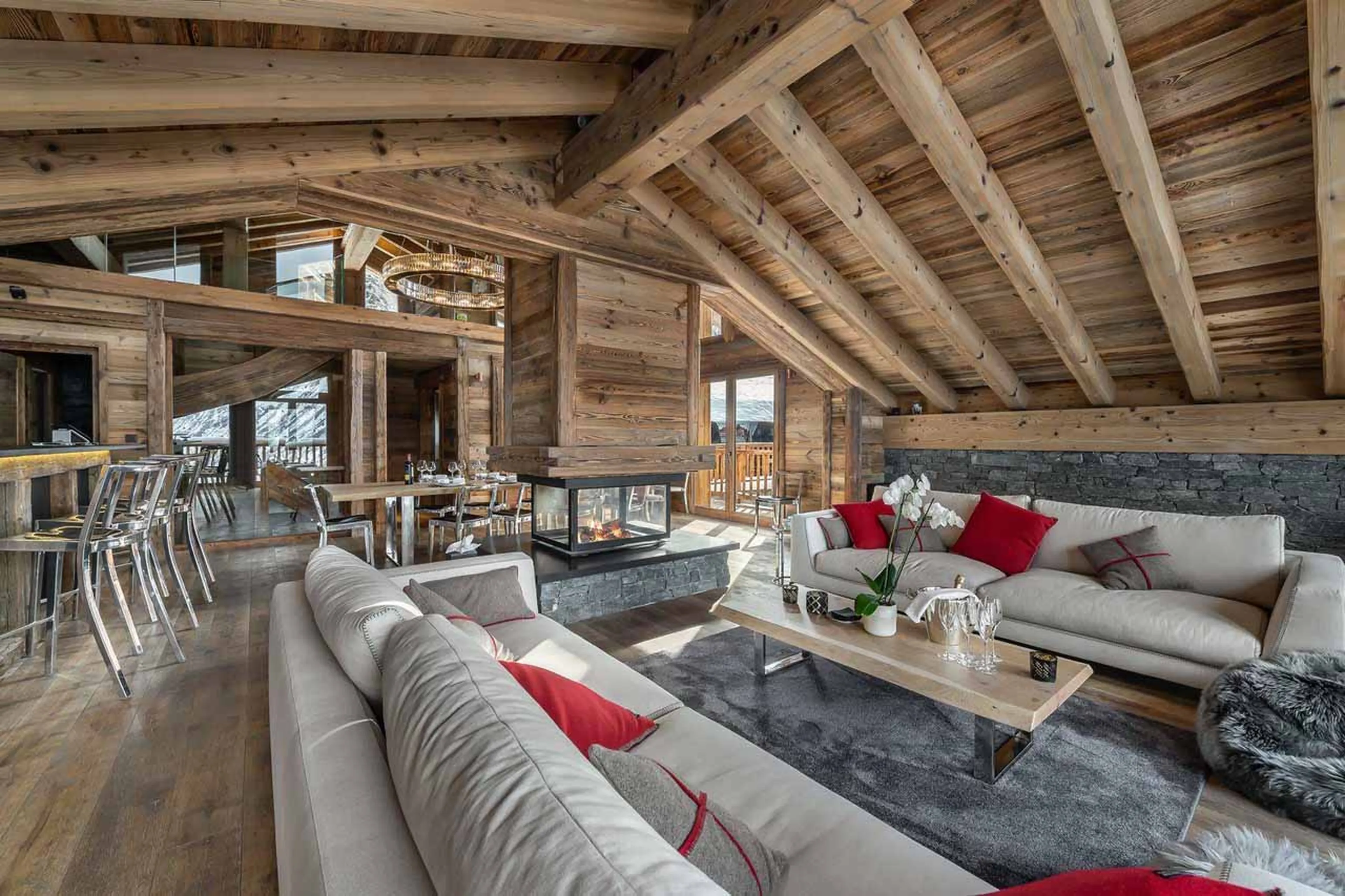 Open plan living area at Chalet Pure Black Crystal in St Martin de Belleville