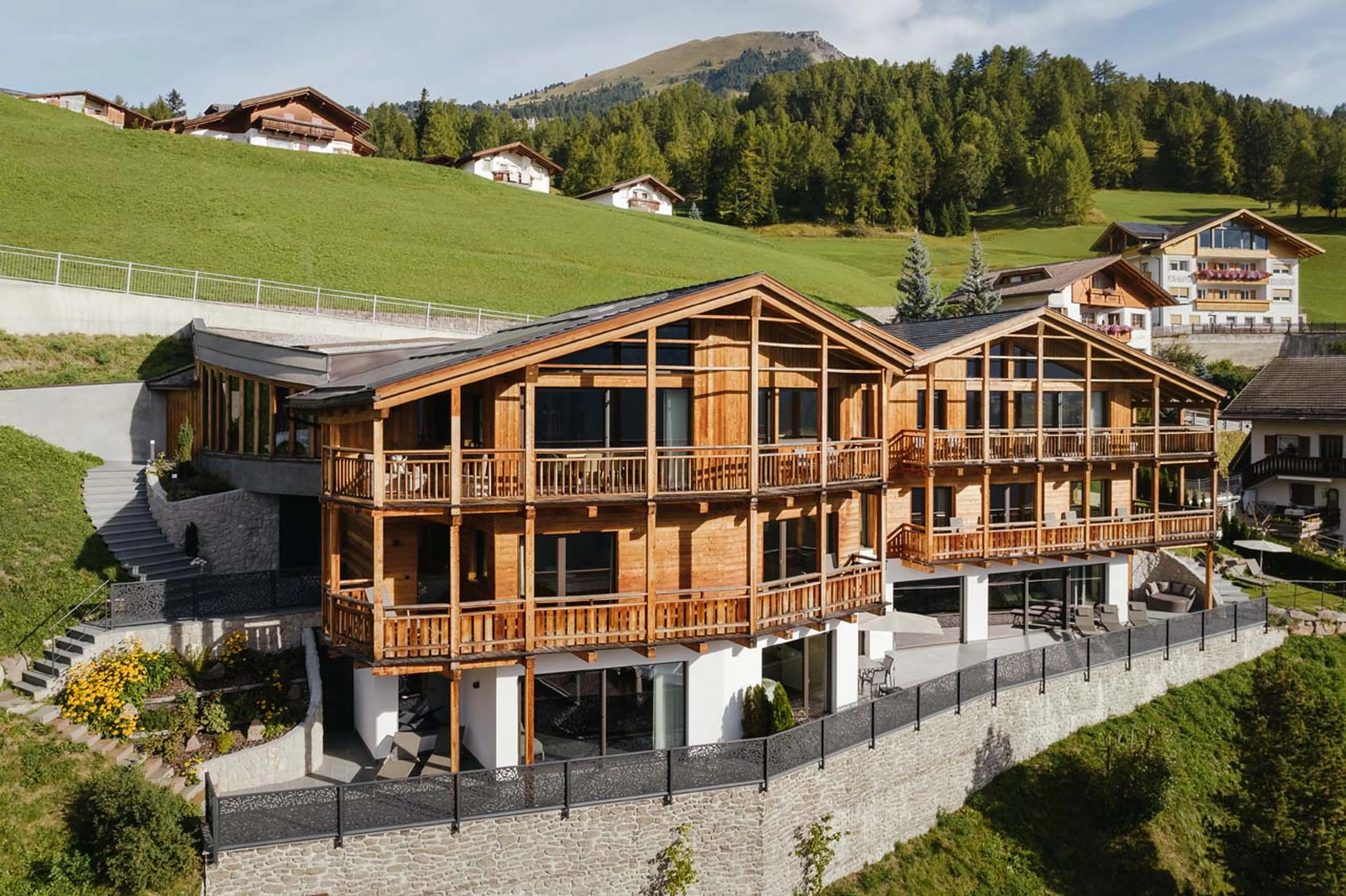 Exterior of chalets at Chalet Robin, Val Gardena