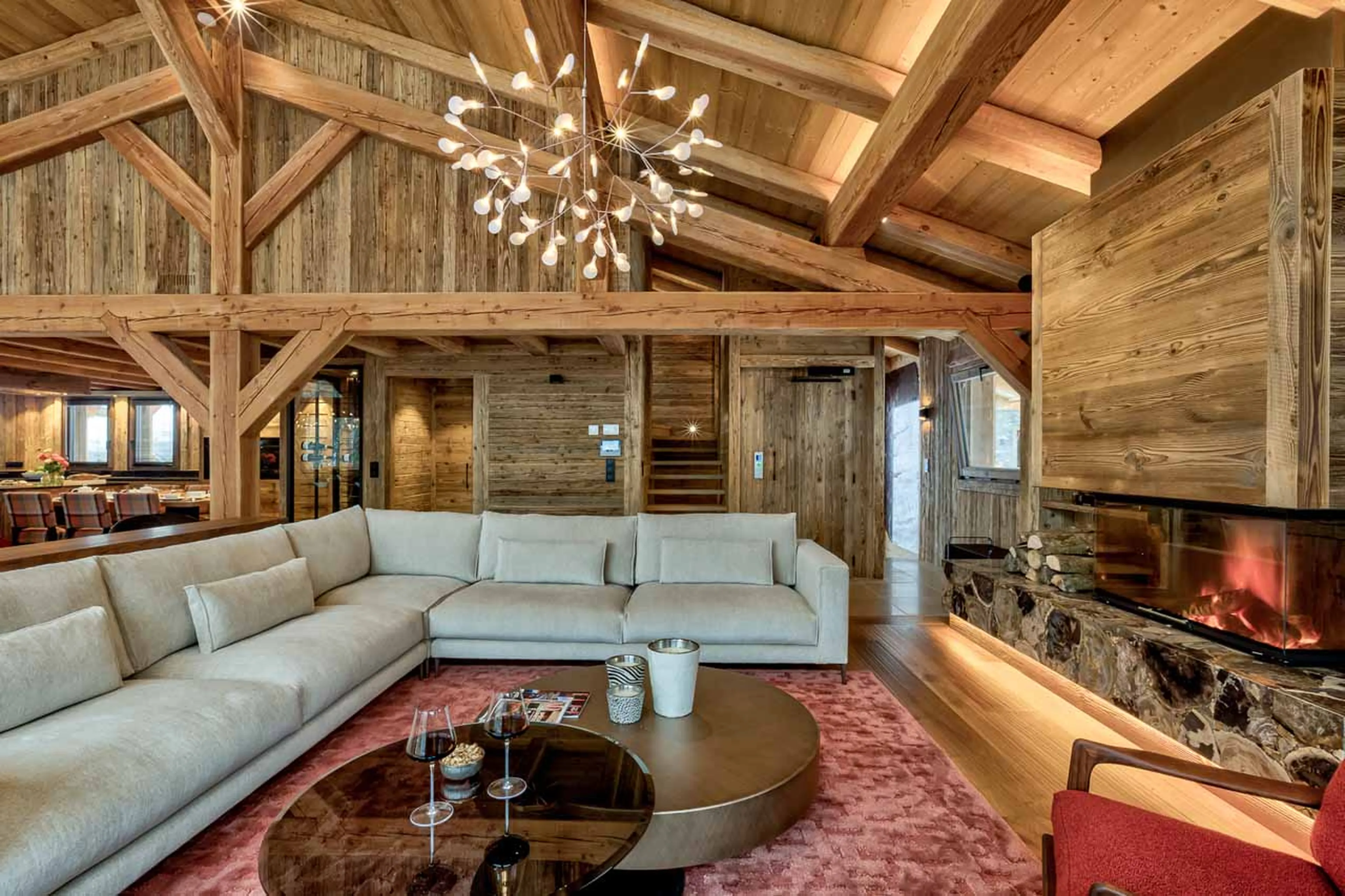 Fireplace and sofas at Chalet Saphir in Chamonix