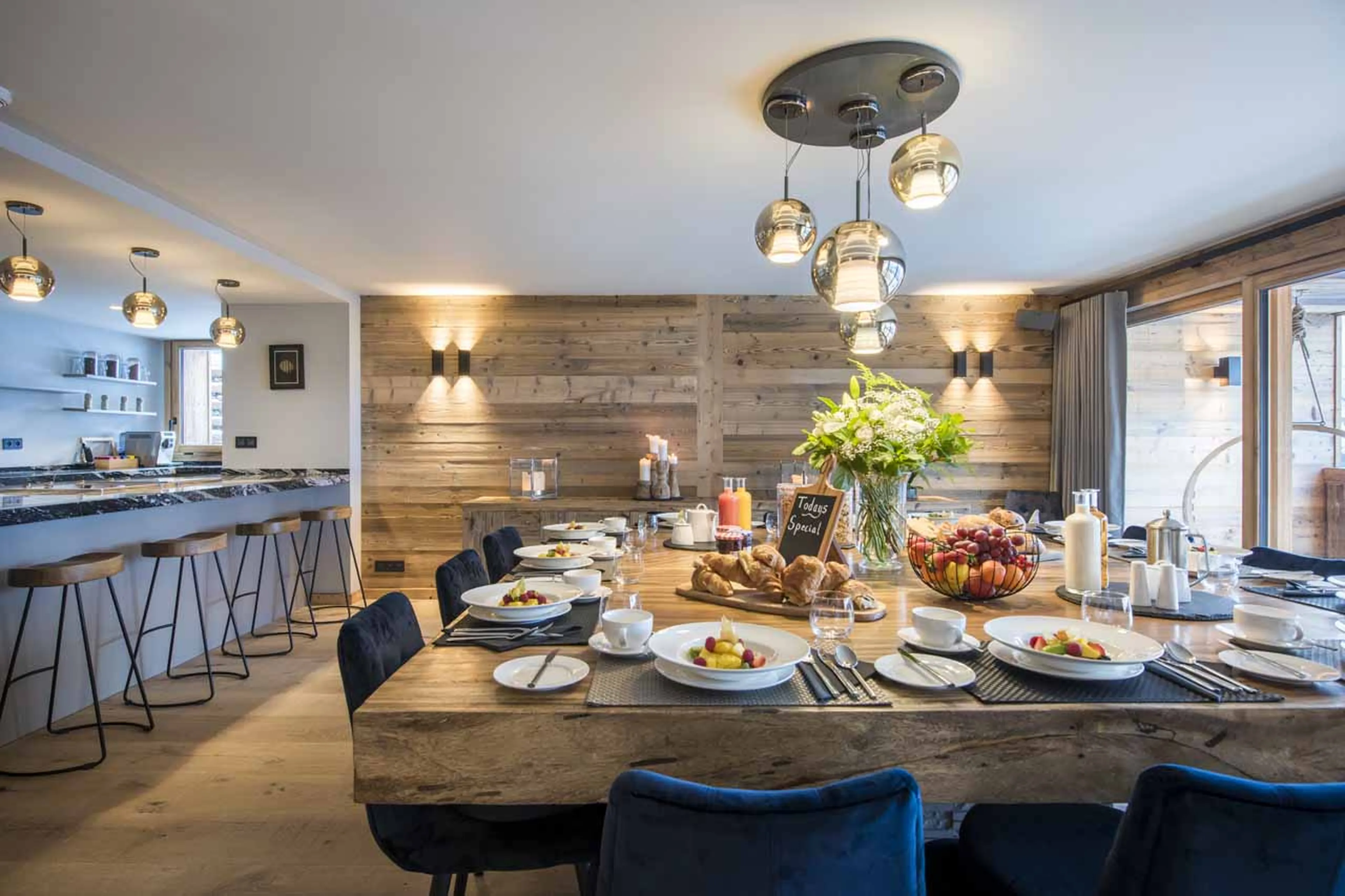 Dining table and breakfast bar at the Sapphire Estate in Morzine