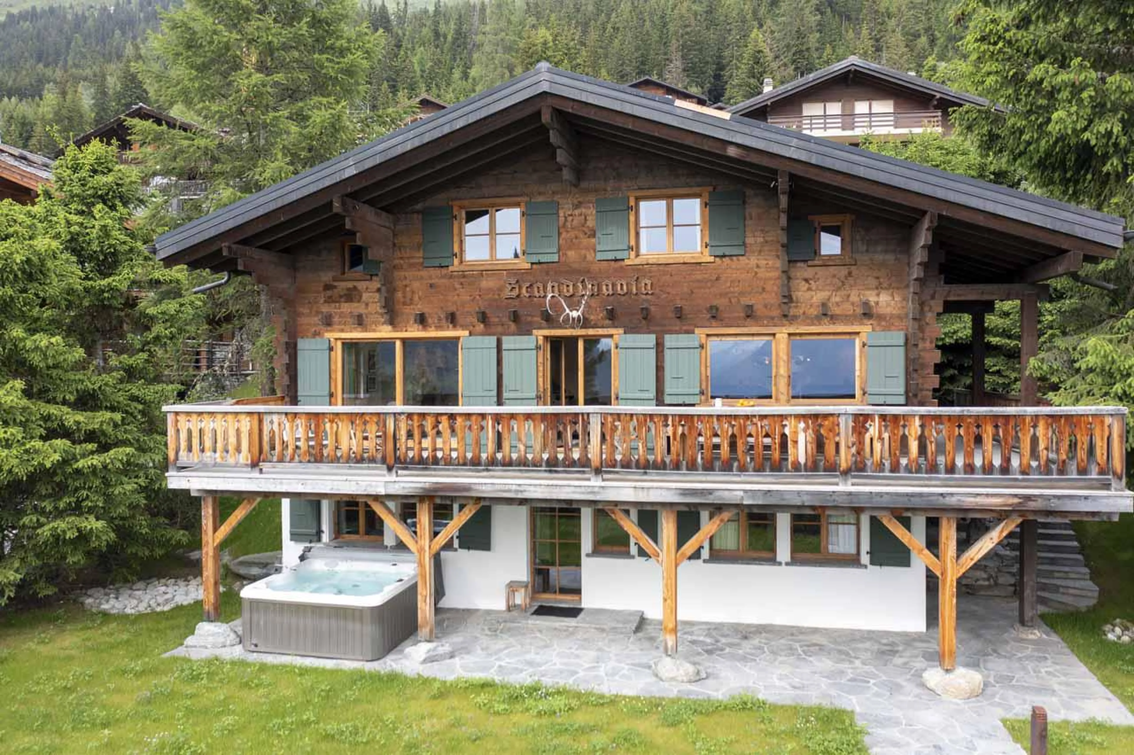 Exterior and wrap-around balcony at Chalet Scandinavia, Verbier, Switzerland