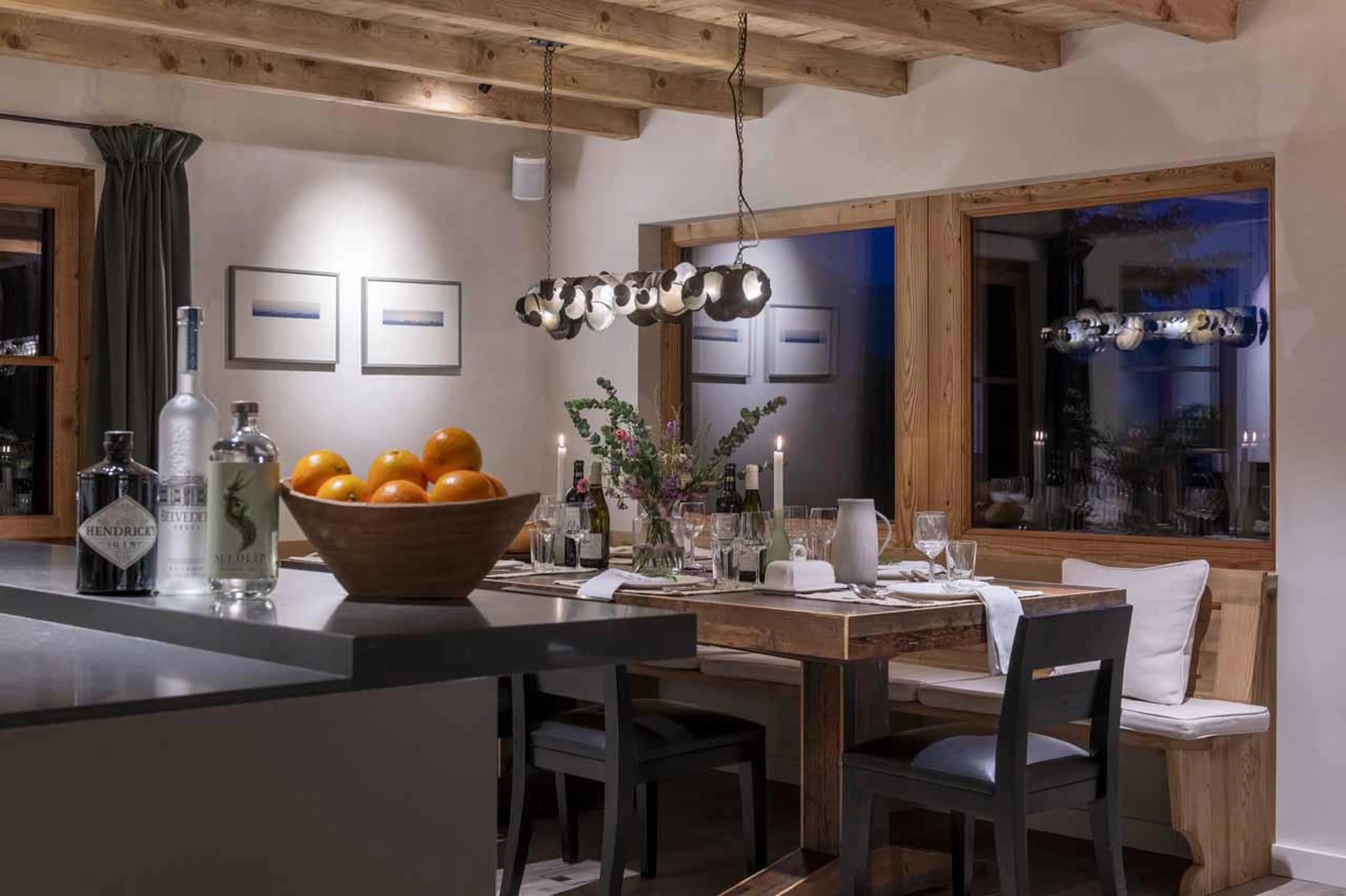 Kitchen island and dining area, Chalet Scandinavia, Verbier, Switzerland