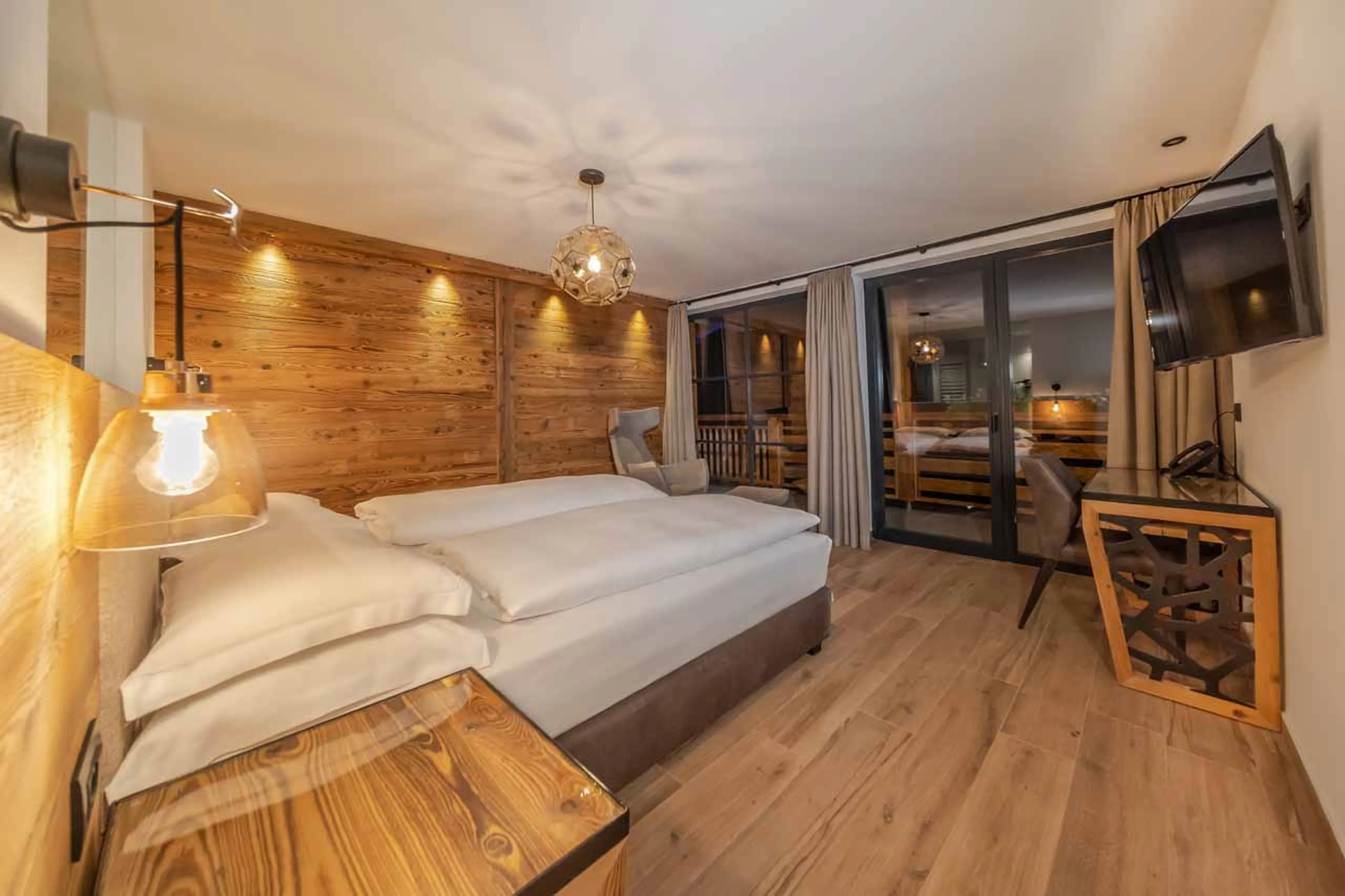 Bedroom one at Chalet Sellaronda in Val Gardena