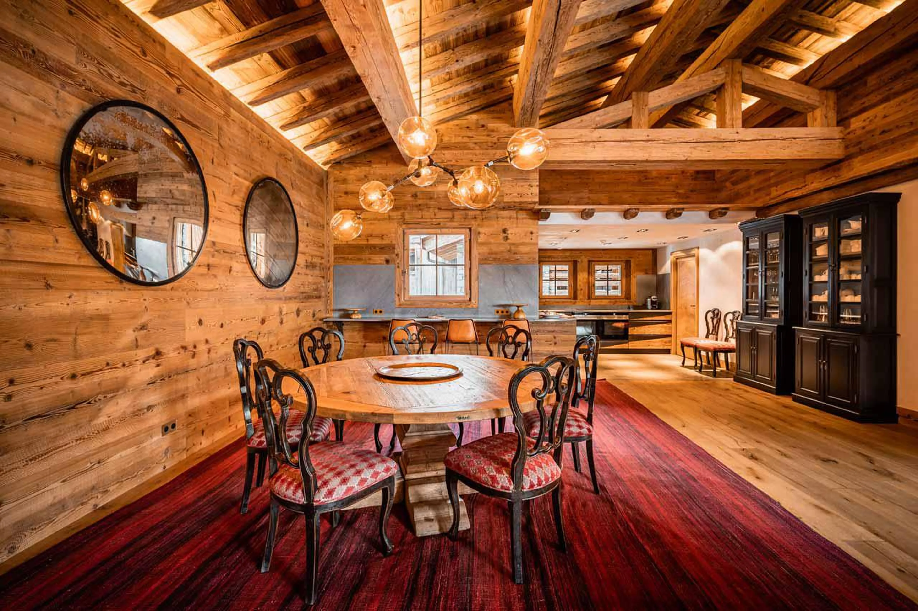 Dining area adjacent to open plan kitchen area of Chalet Sequoia in Val d’ Isere