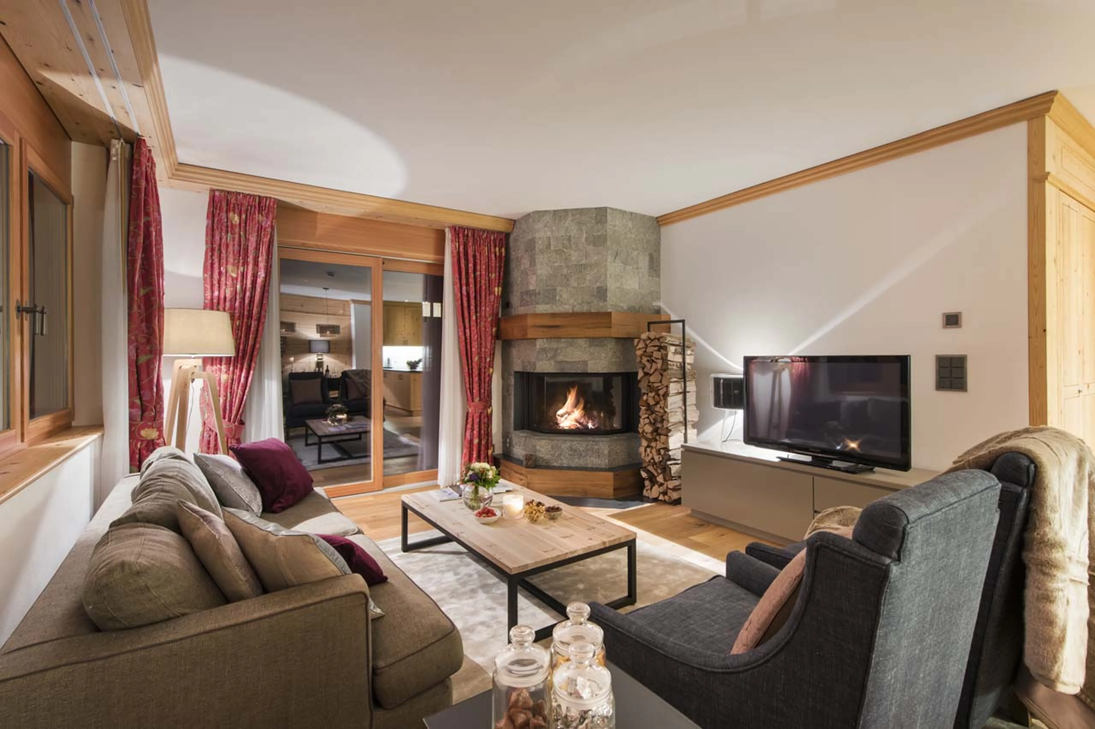 Snug living area at night in Chalet Shalimar in Zermatt