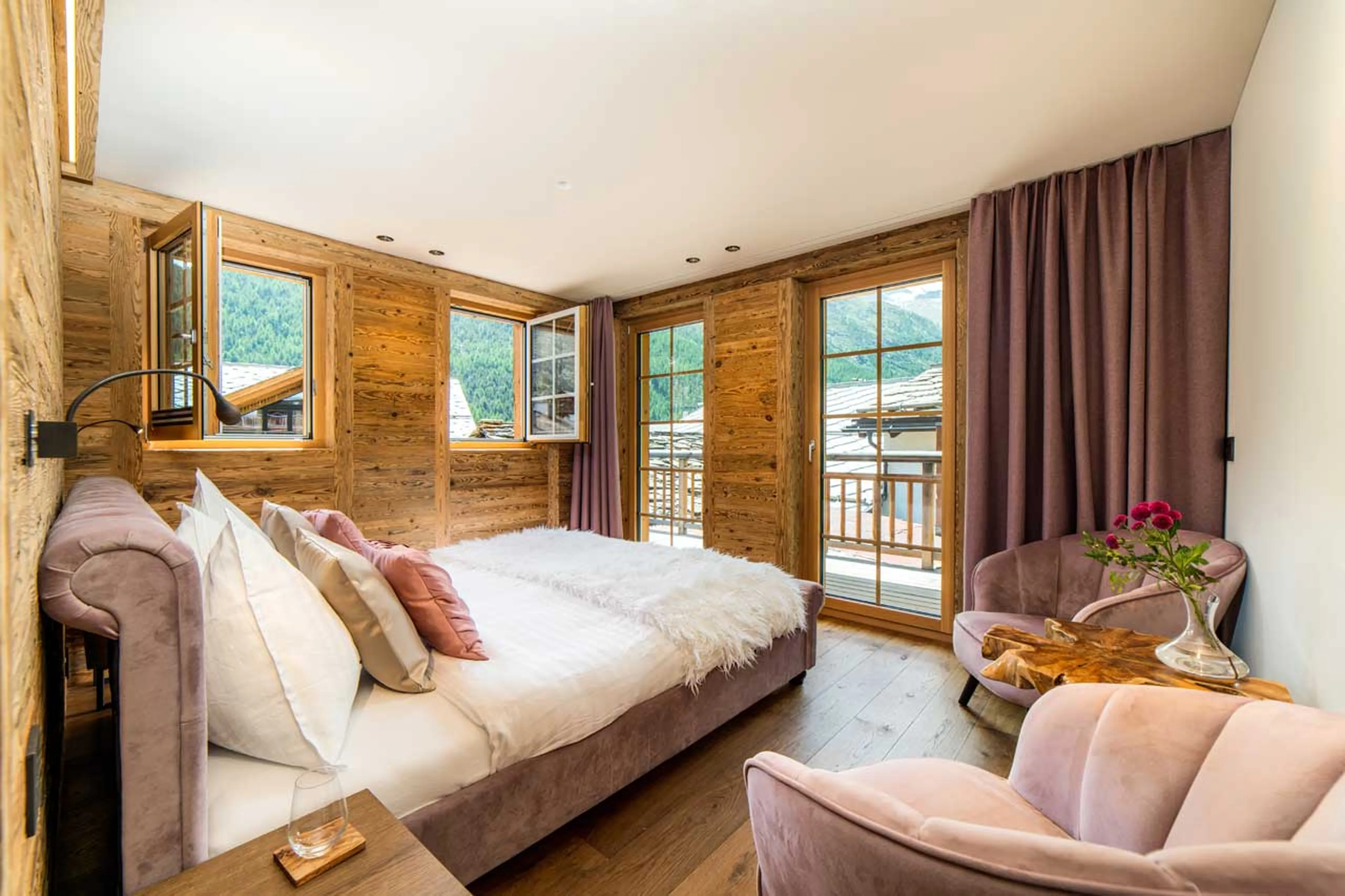 Balcony access from bedroom at Chalet Simon in Saas Fee