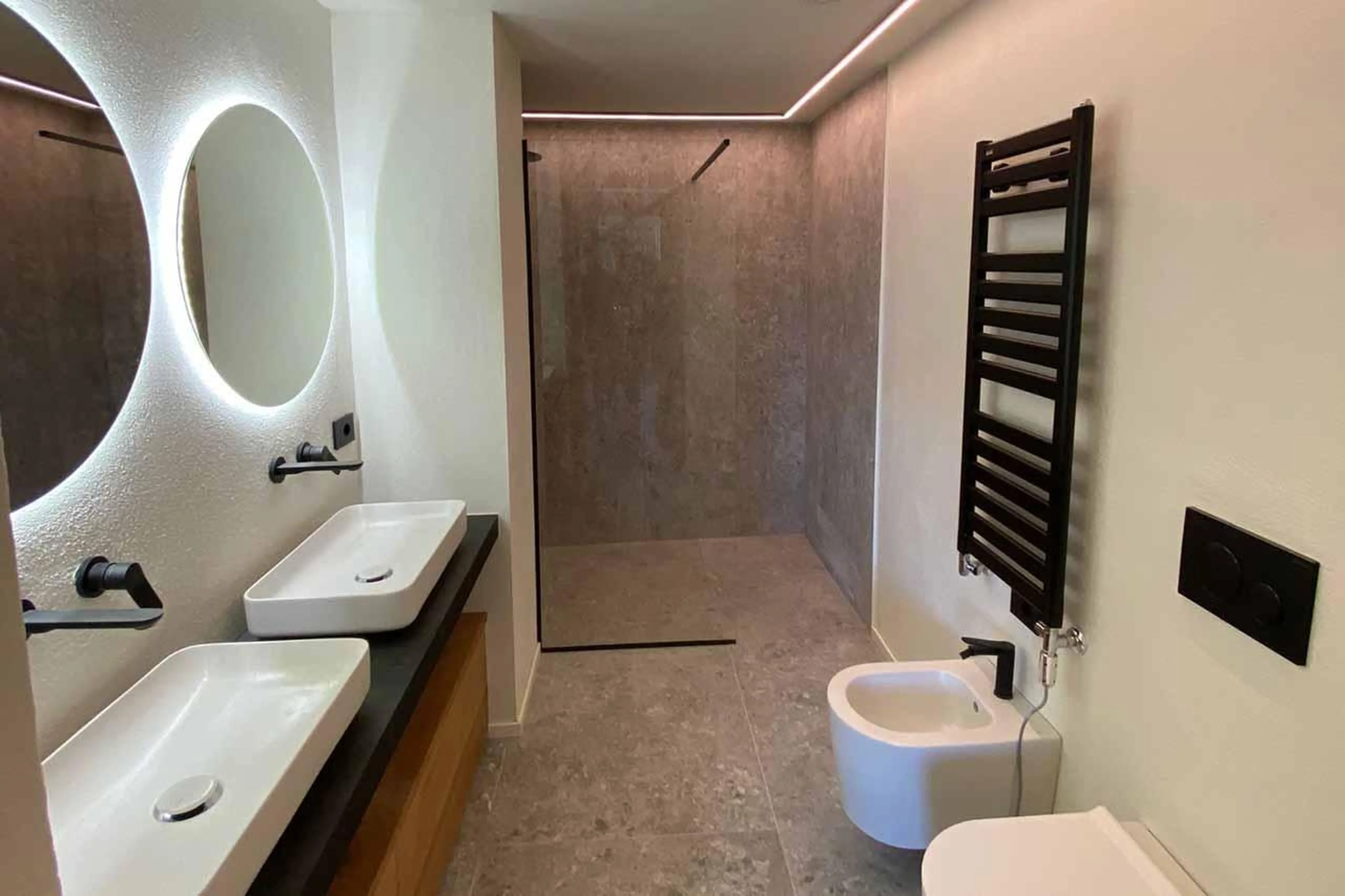 En-suite shower room with double basin at Chalet Snostorm in Breuil-Cervinia
