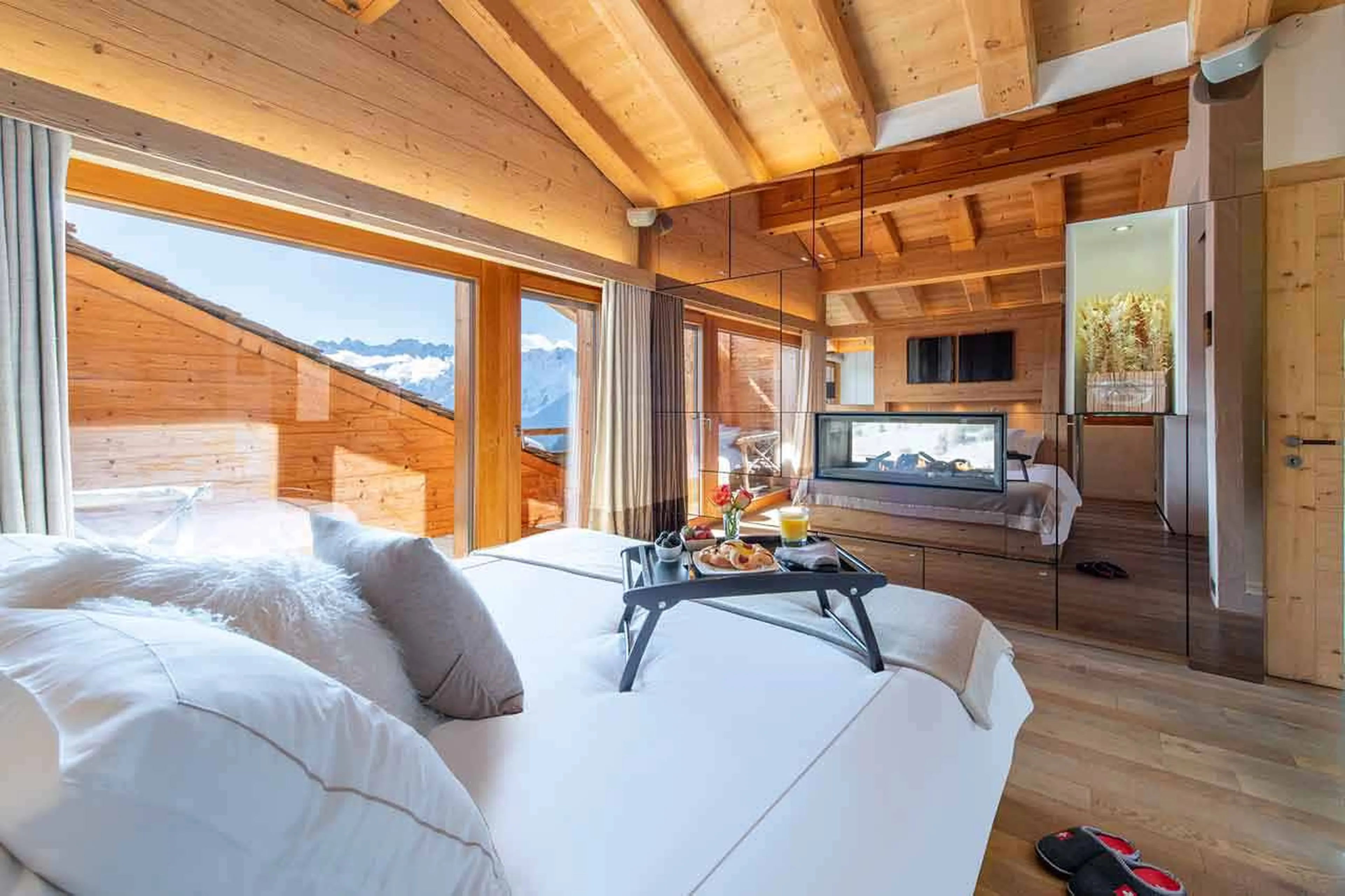 Super-king size bed in master suite of Chalet Spa in Verbier