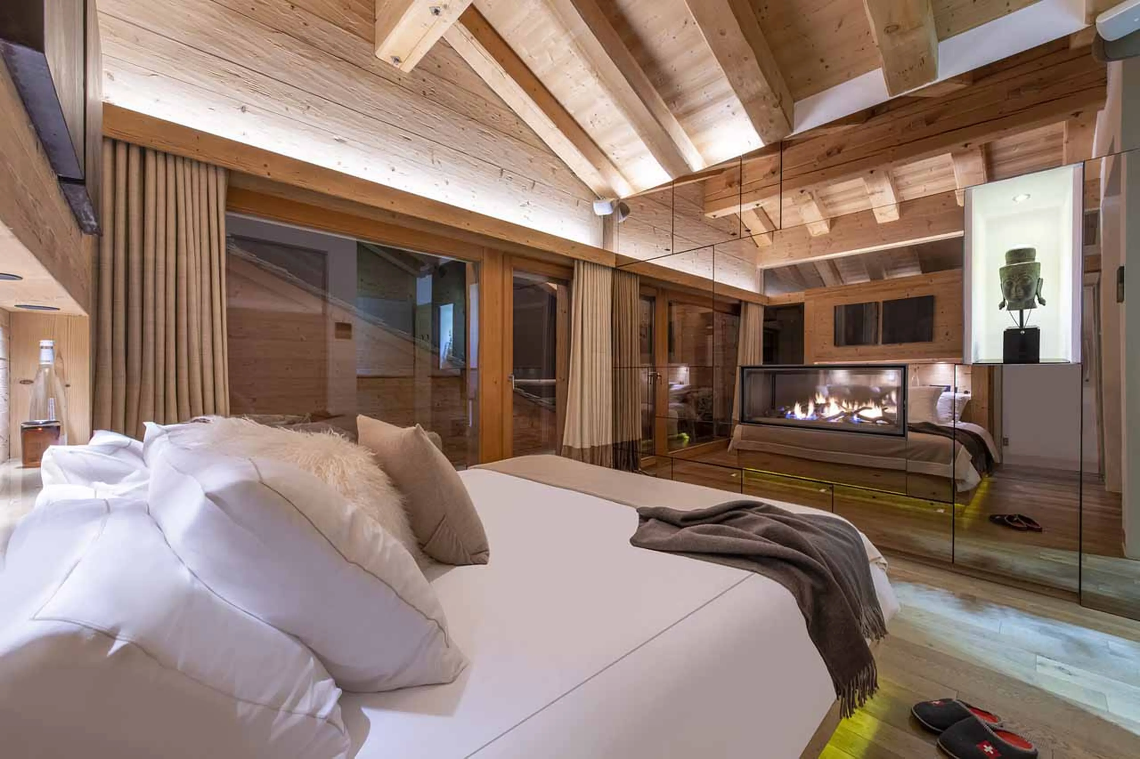 Fireplace in master suite at Chalet Spa in verbier