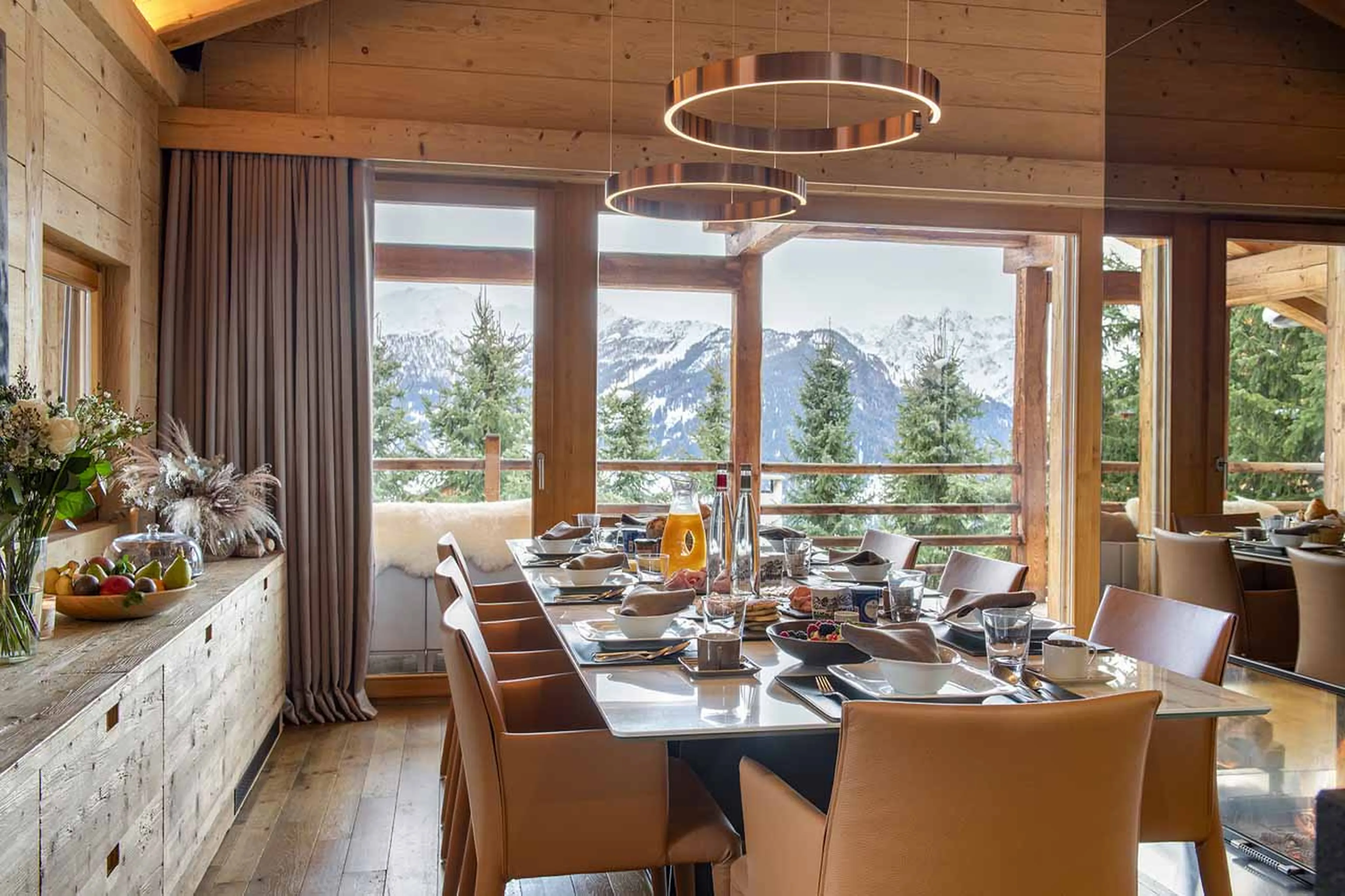 Access to balcony from dining area at Chalet Spa in Verbier
