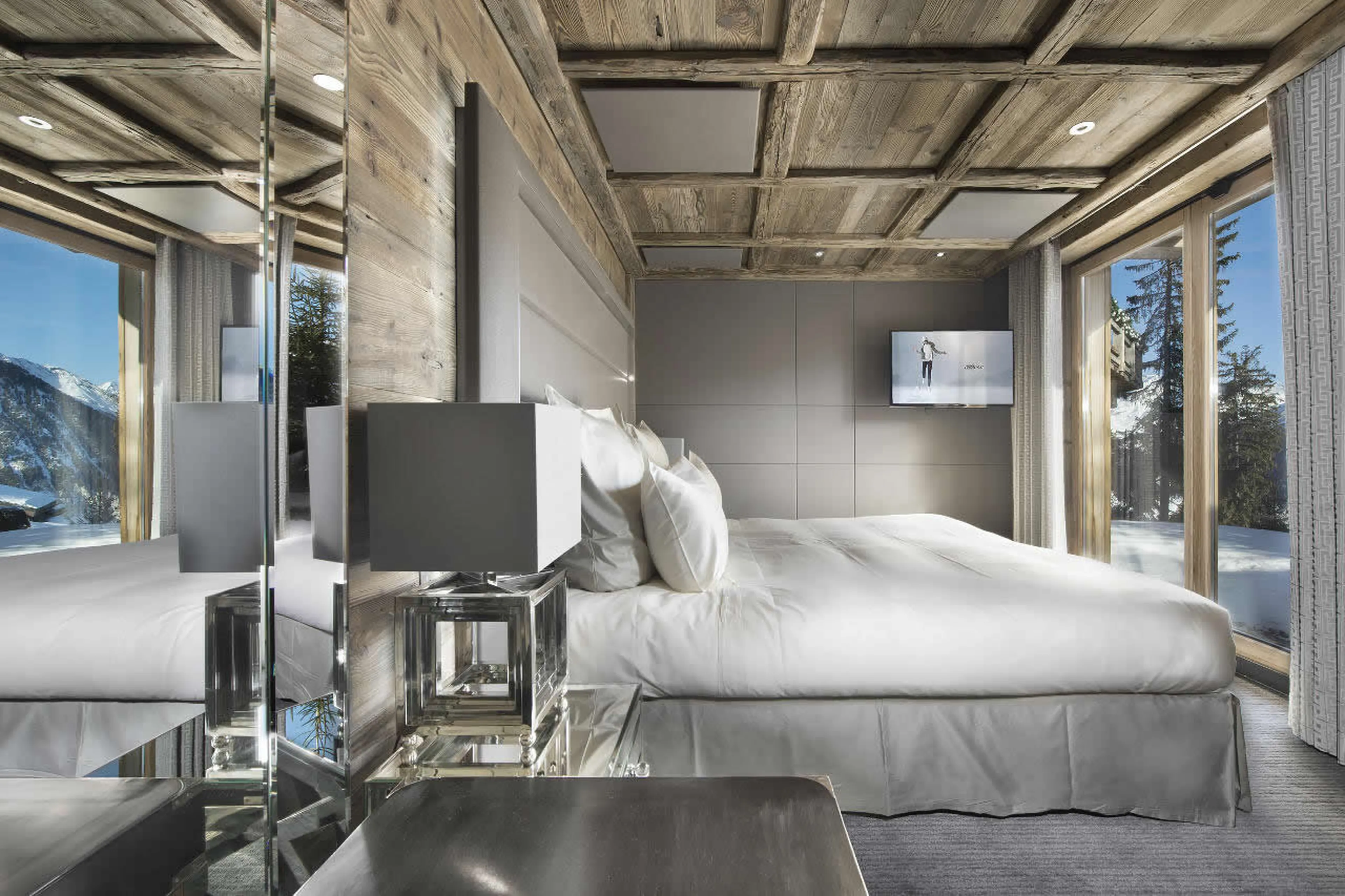 Beautiful bedroom with view from terrace of Chalet Tahoe in Courchevel 1850