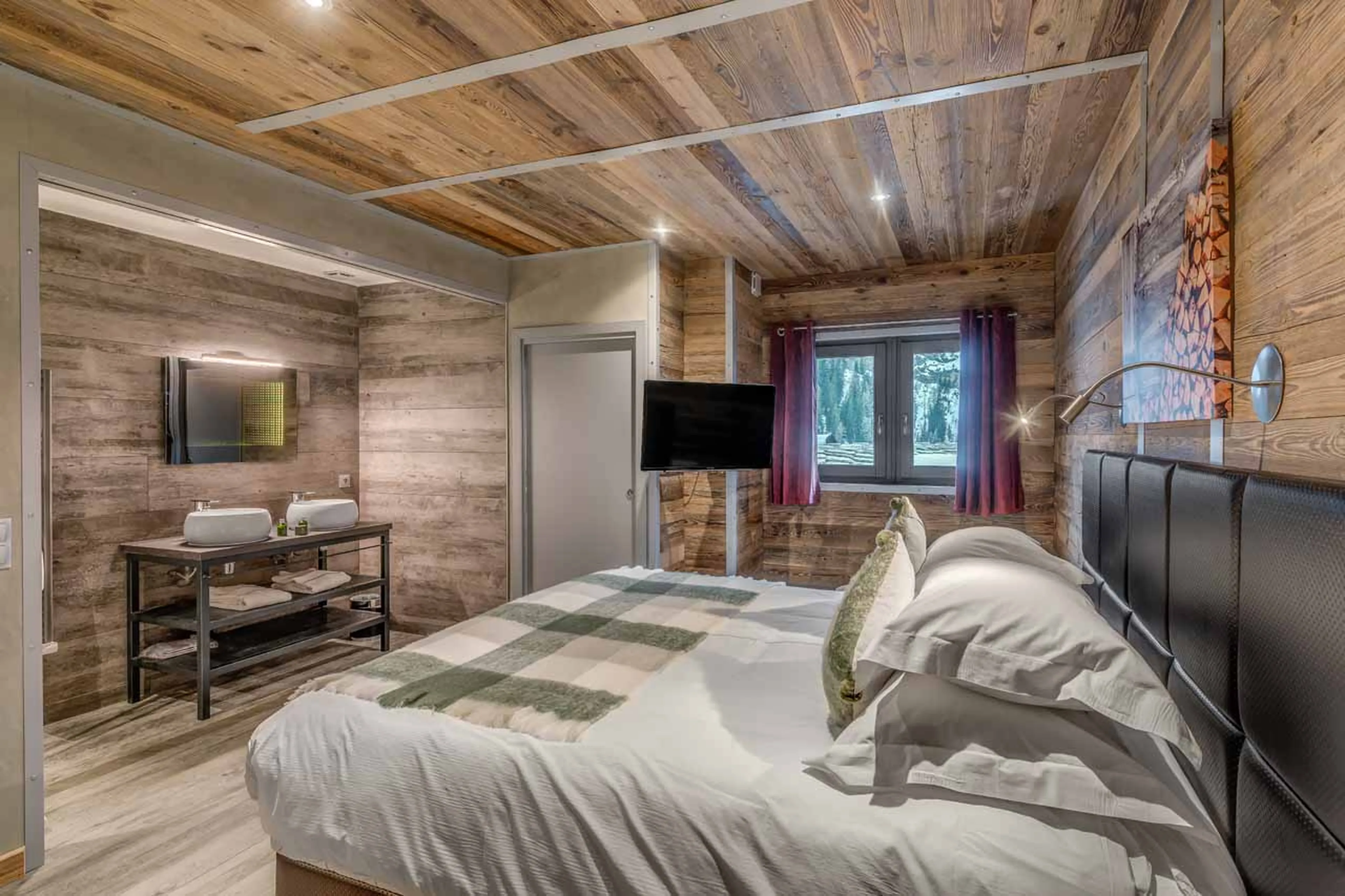 TV in bedroom two at Chalet Tango in Tignes