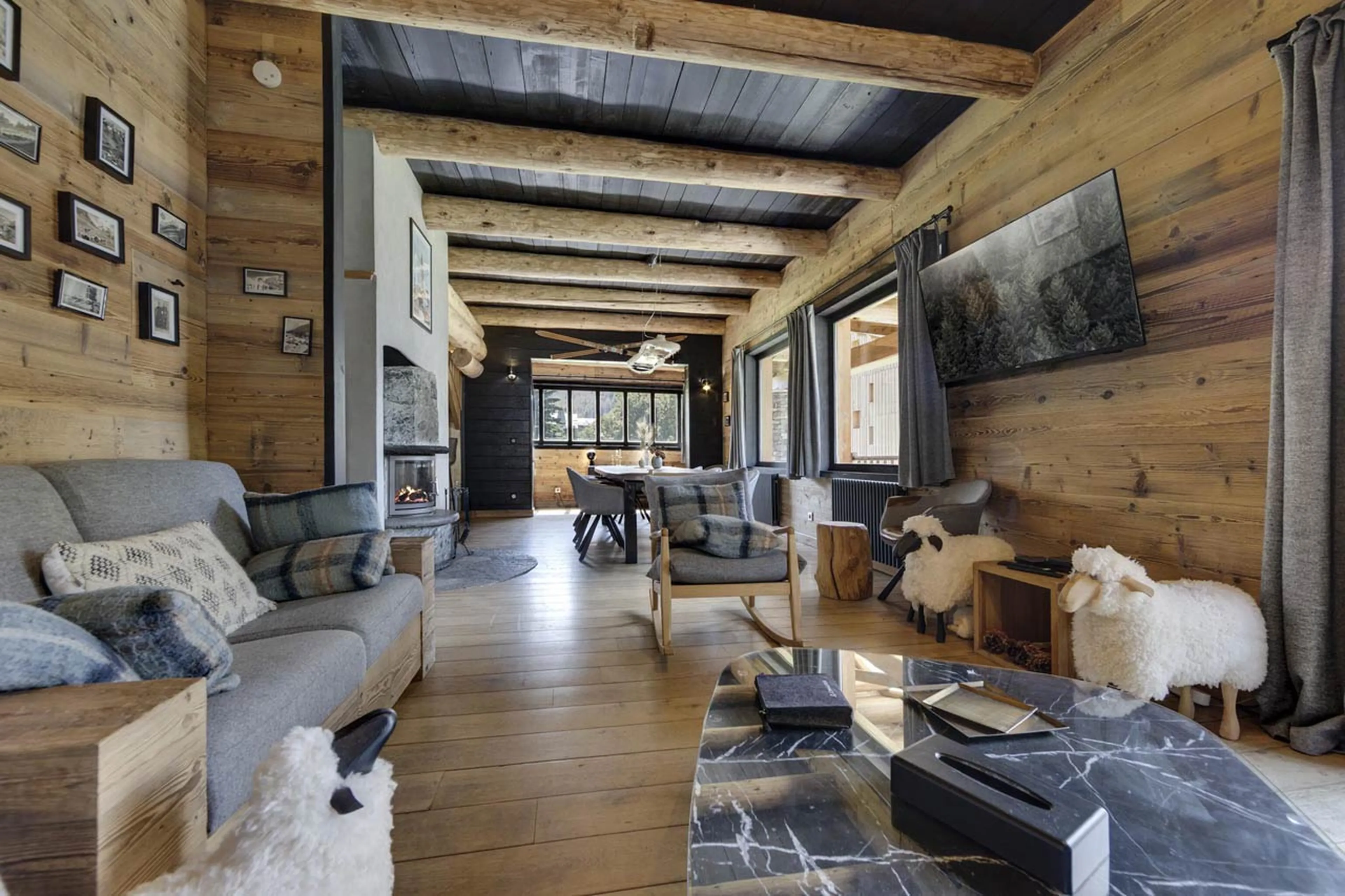 Fireplace and dining area at Chalet Thovex in Val d'Isere