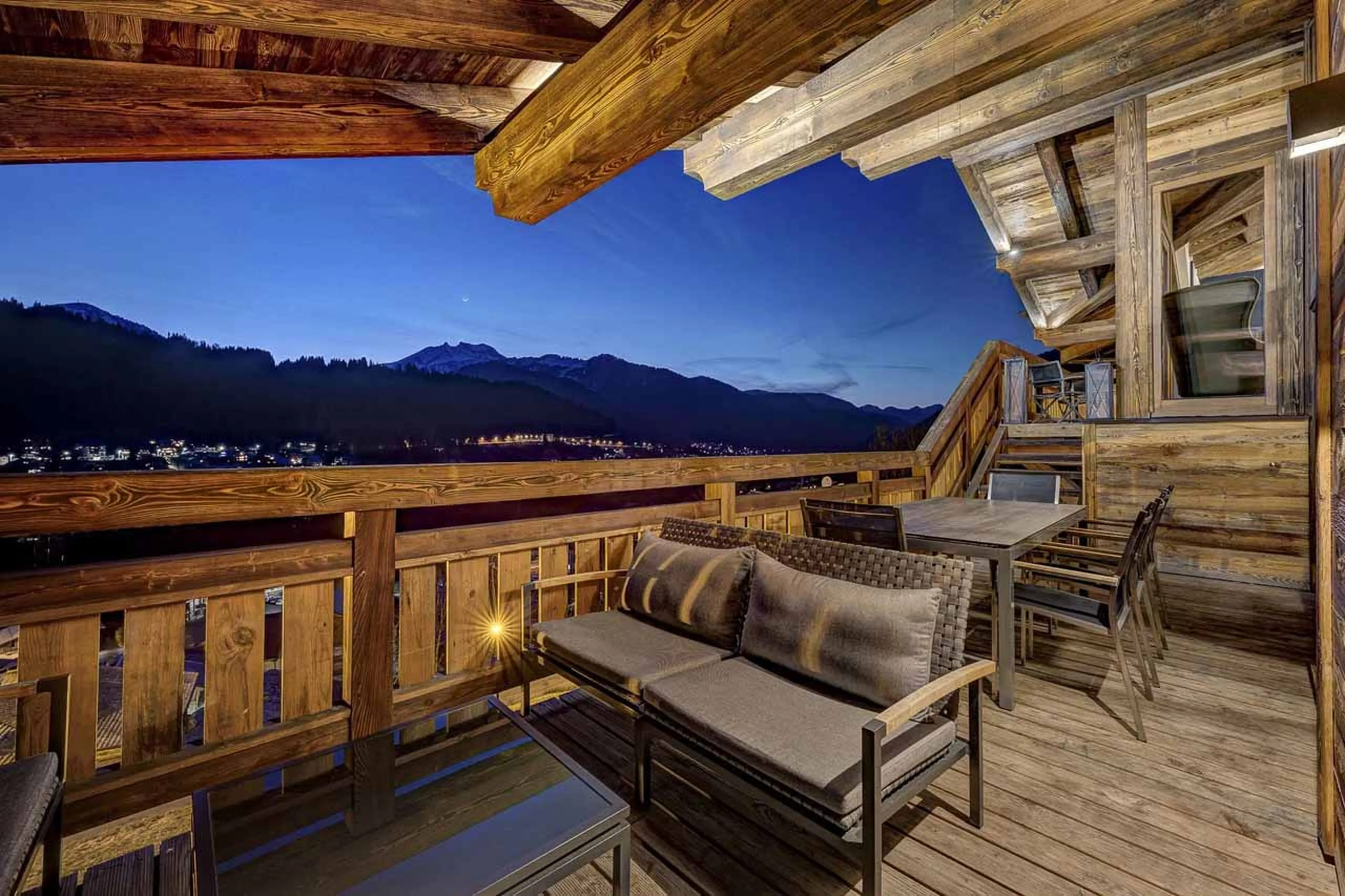 Outdoor dining on balcony at Chalet Goldilocks & Three Bears in Morzine