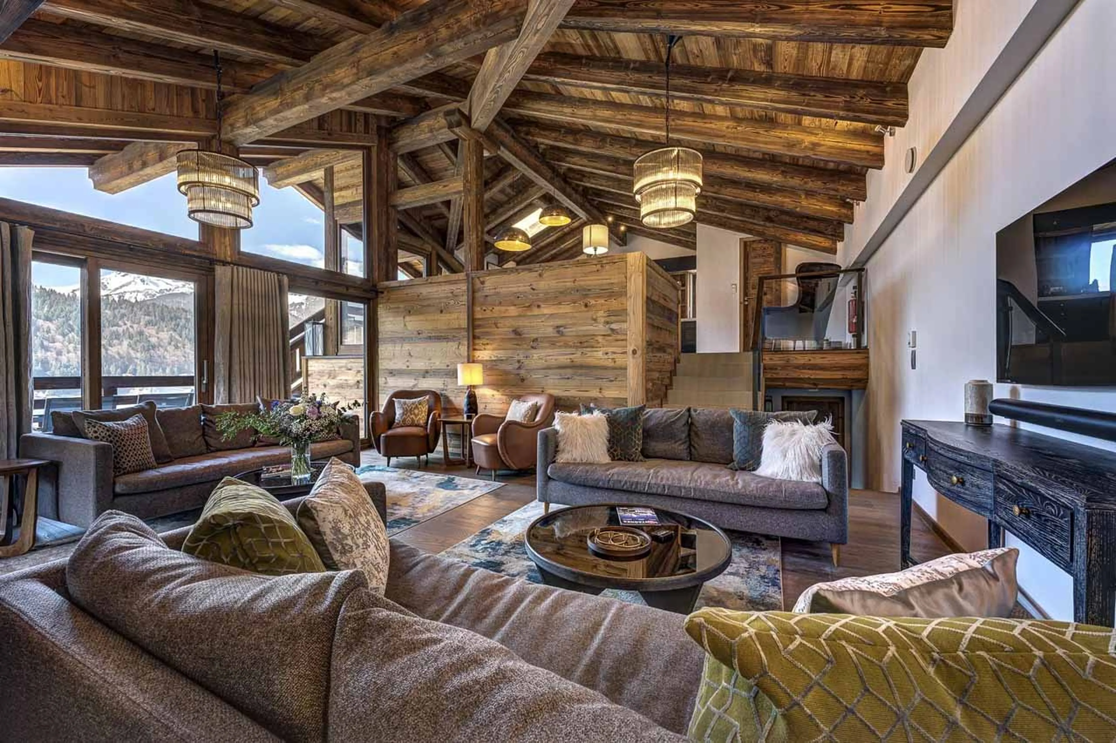 Living room with fireplace and floor-to-ceiling windows