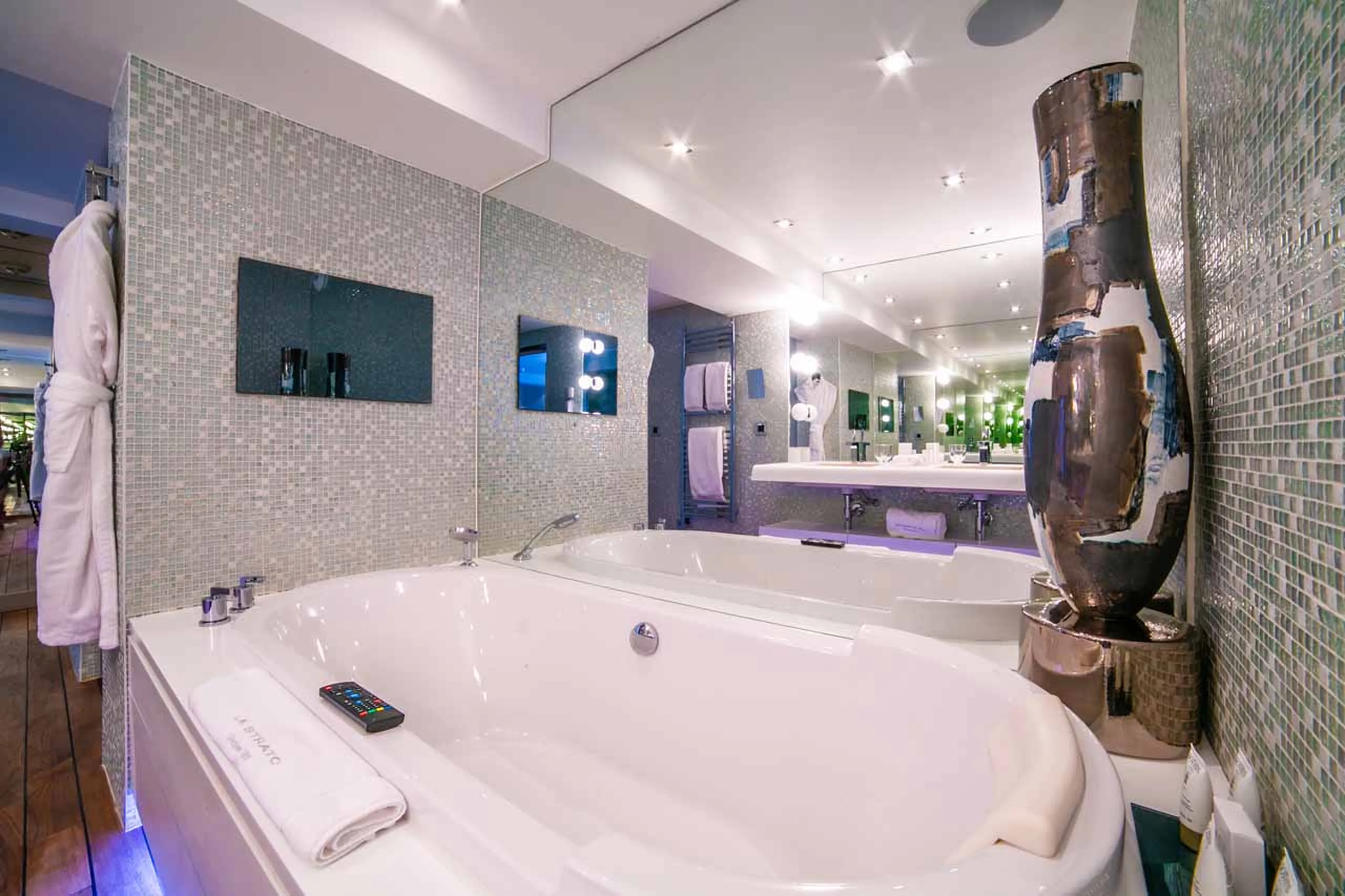 Bathtub with TV at Chalet Timeless in Courchevel 1850