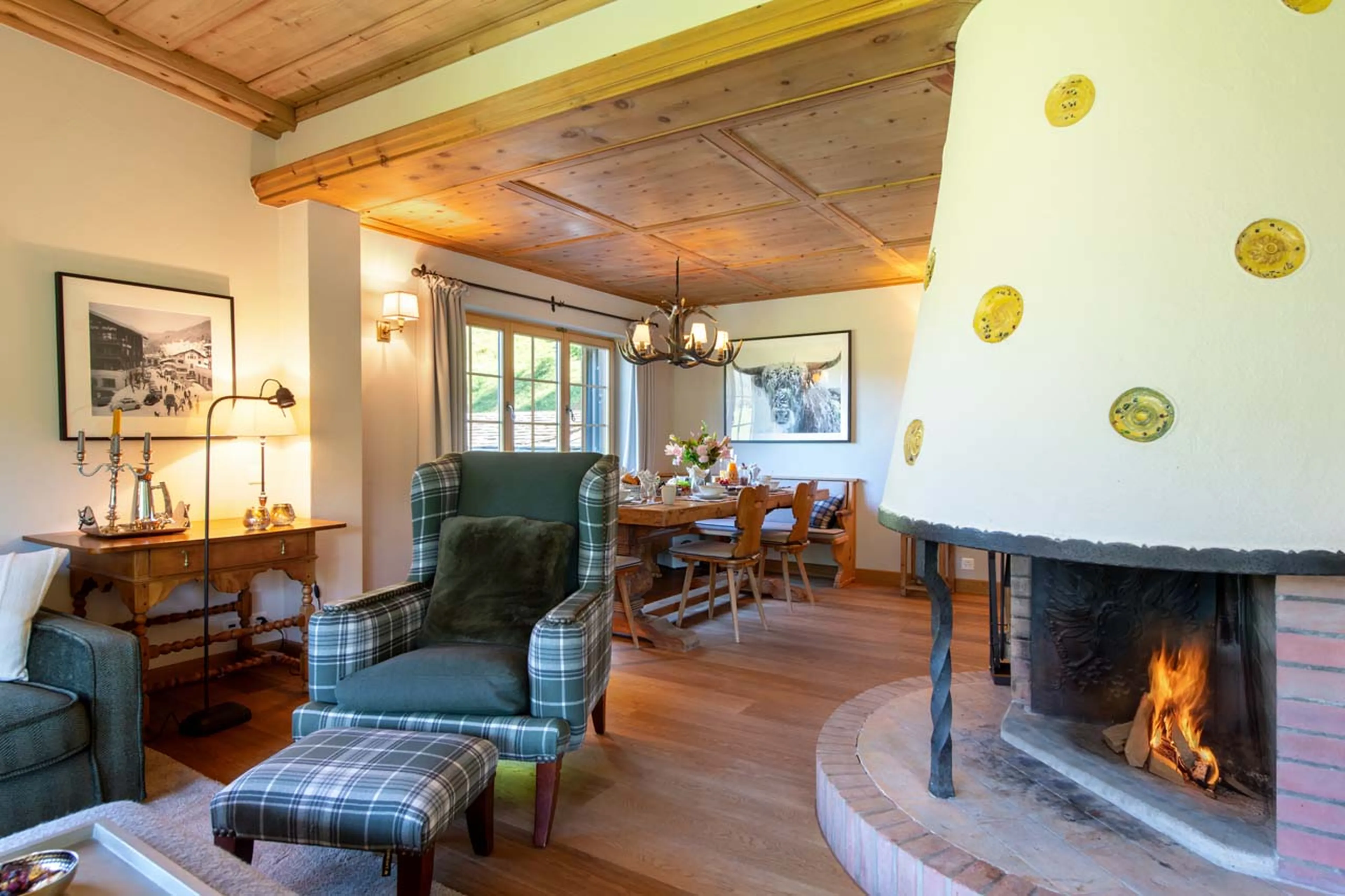 Fireplace in living area at Chalet Tschuetta in Klosters