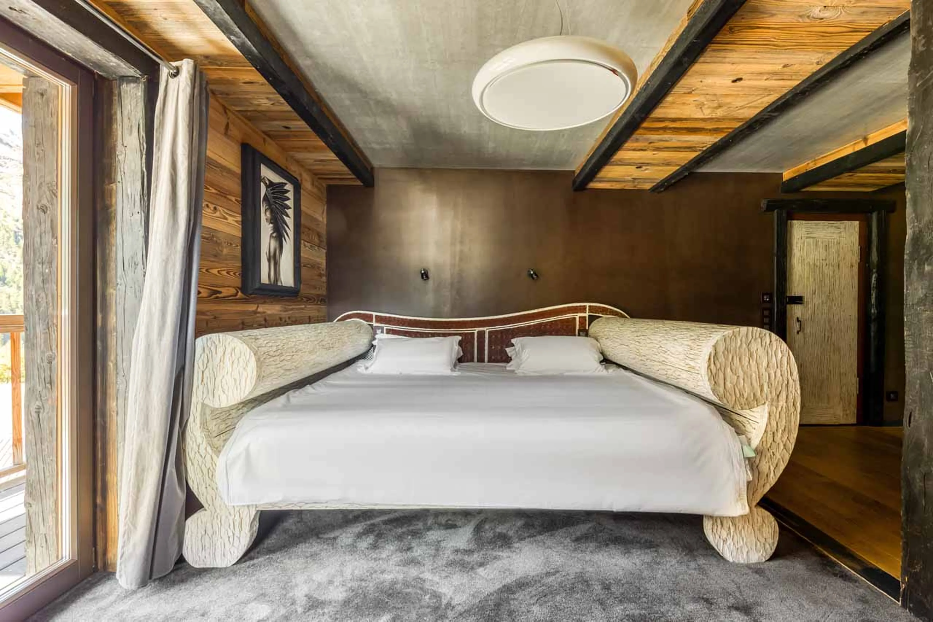 Unique bed in bedroom two at Chalet Ubud in Tignes