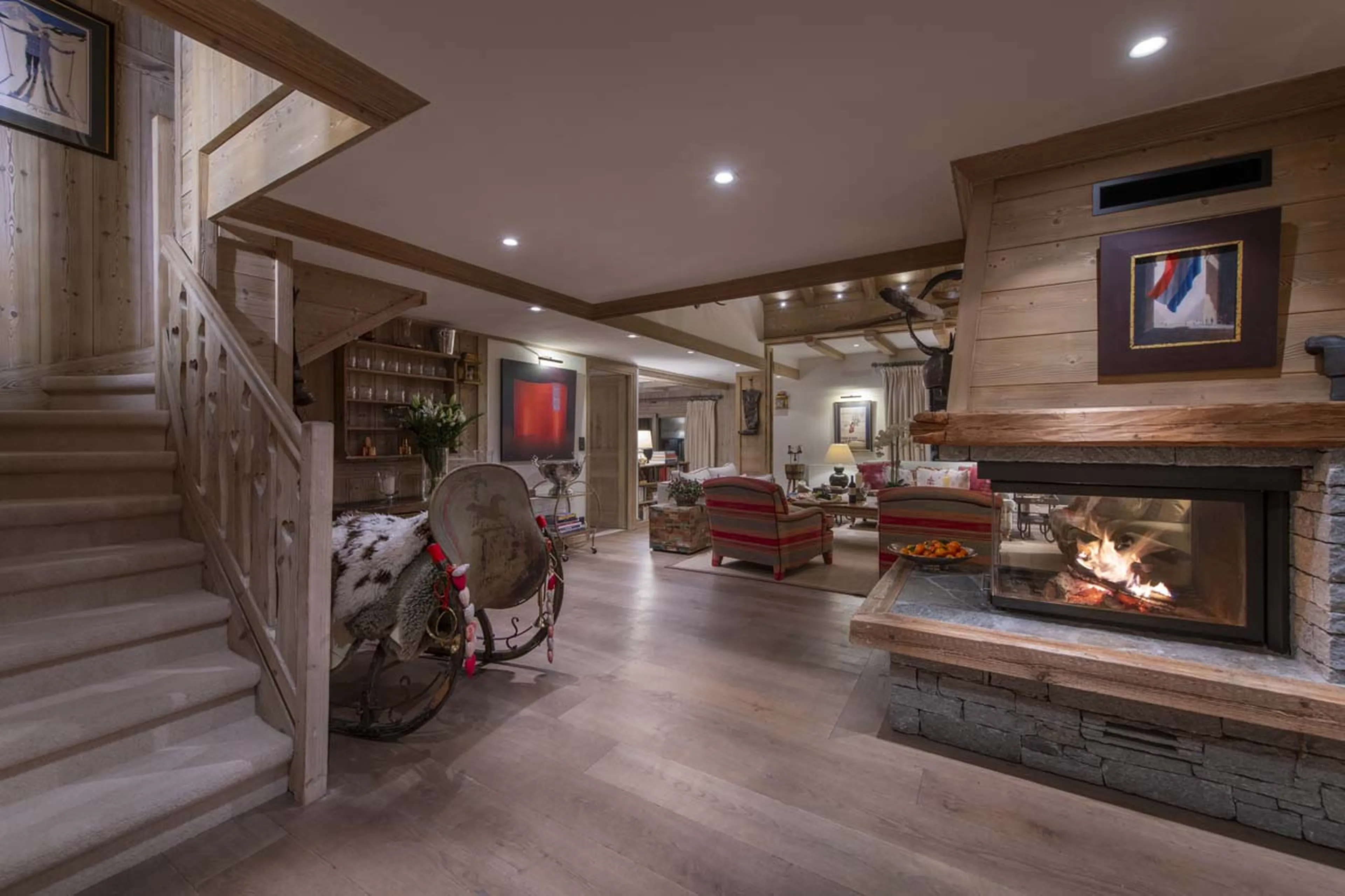Staircase and fireplace at Chalet valentine in Meribel