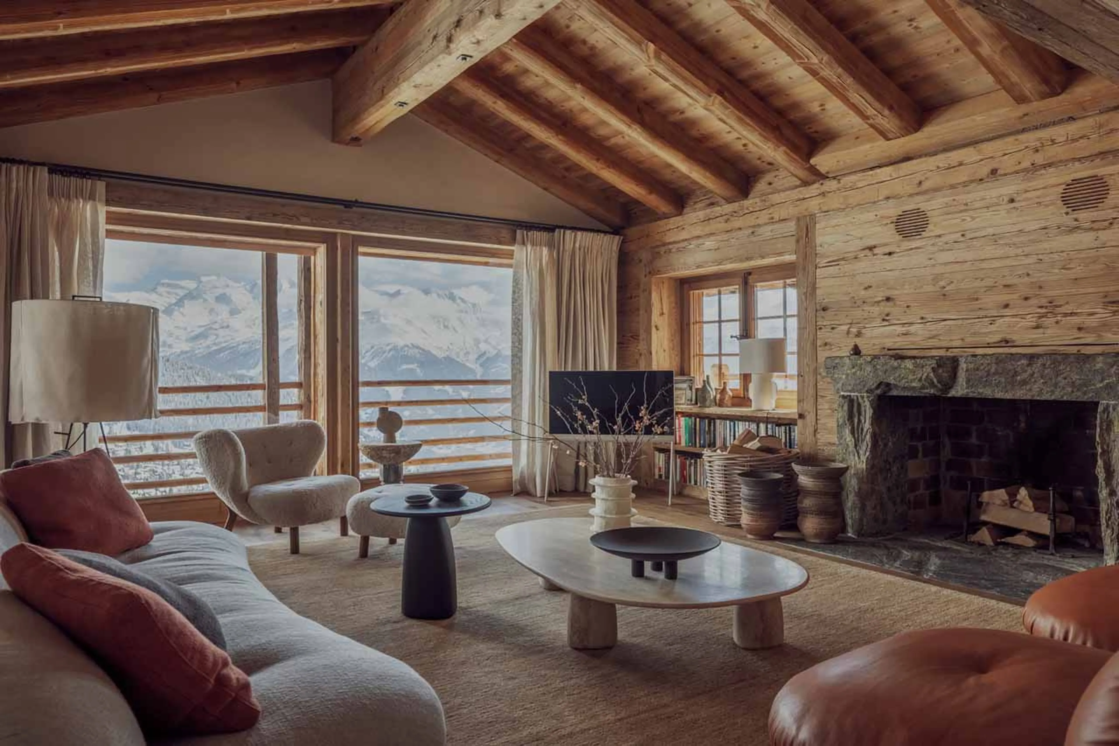 Living area fireplace at Vallon D'Arbi in Verbier