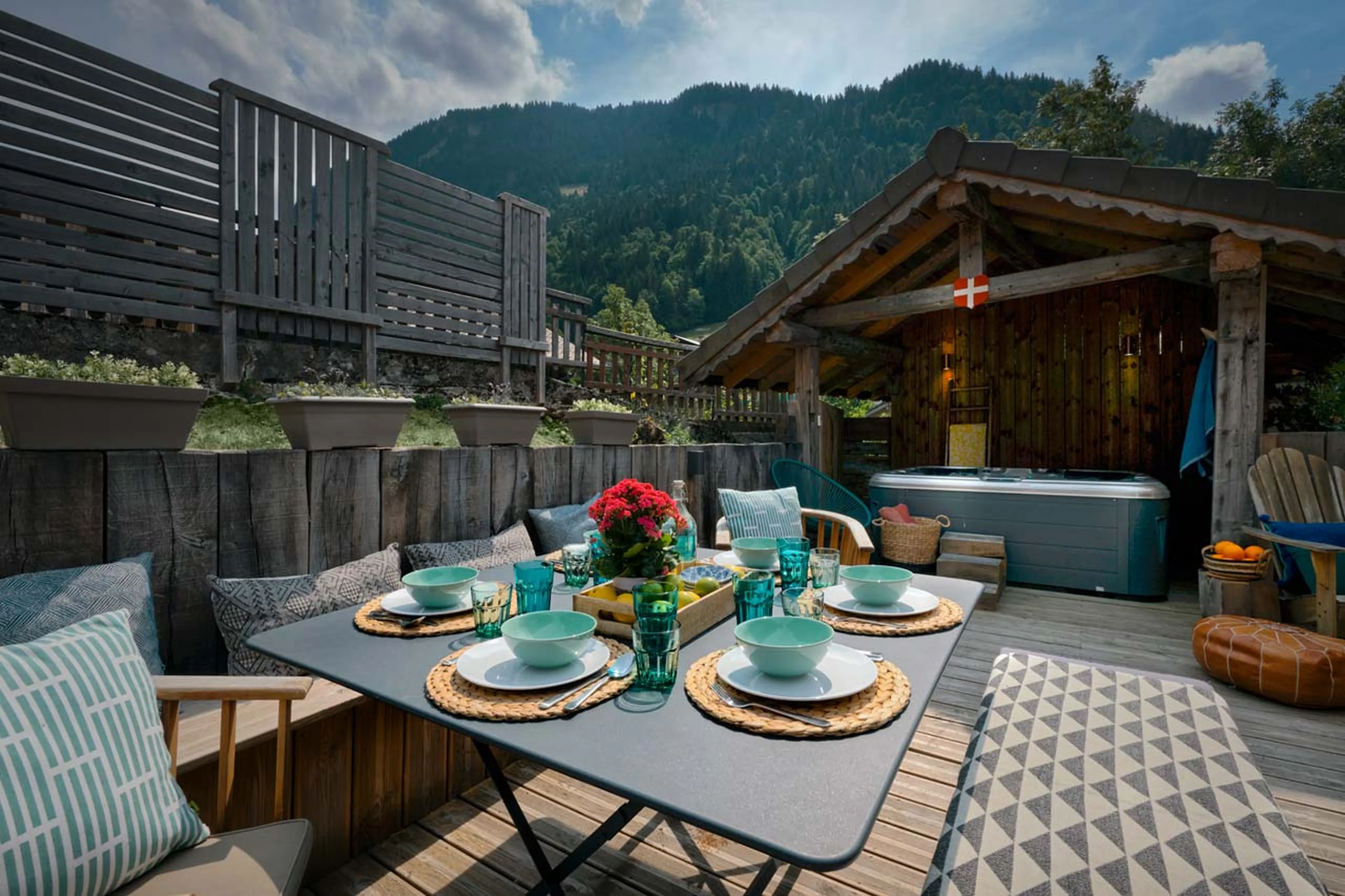 Terrace with dining table at Chalet Vesper in Morzine