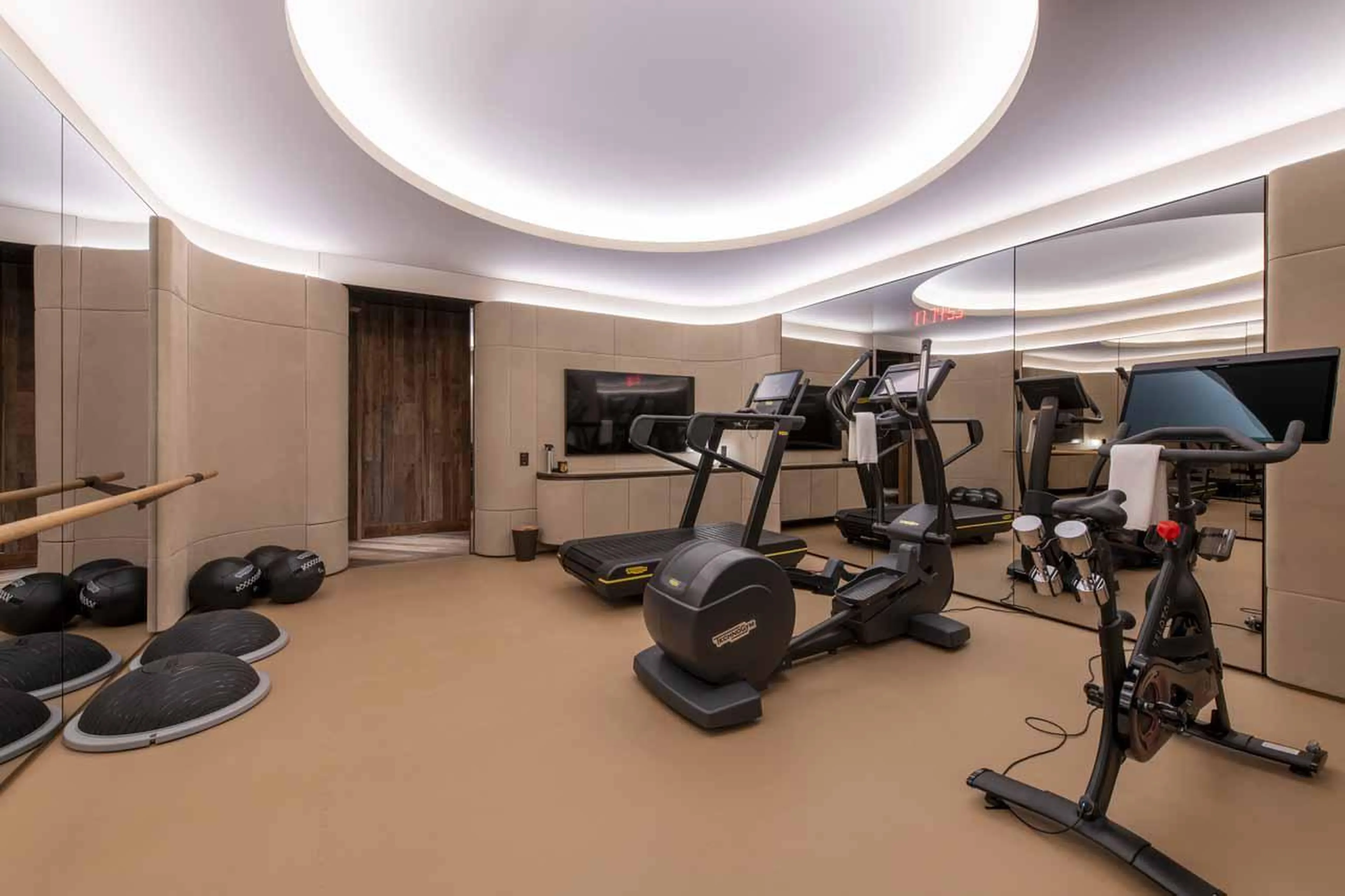 Gym with cutting-edge fitness technology at Chalet Vicuna in Verbier