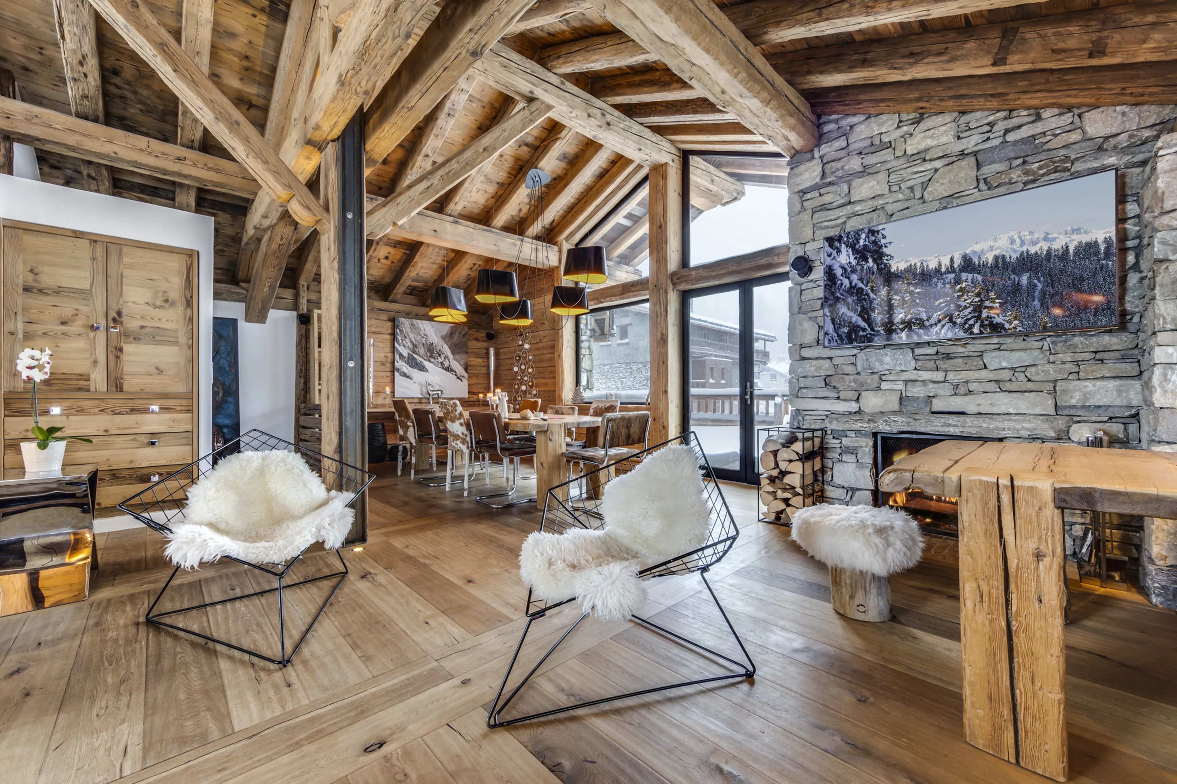 Fireplace in living area at Chalet Vieux Pont in Val d'Isere